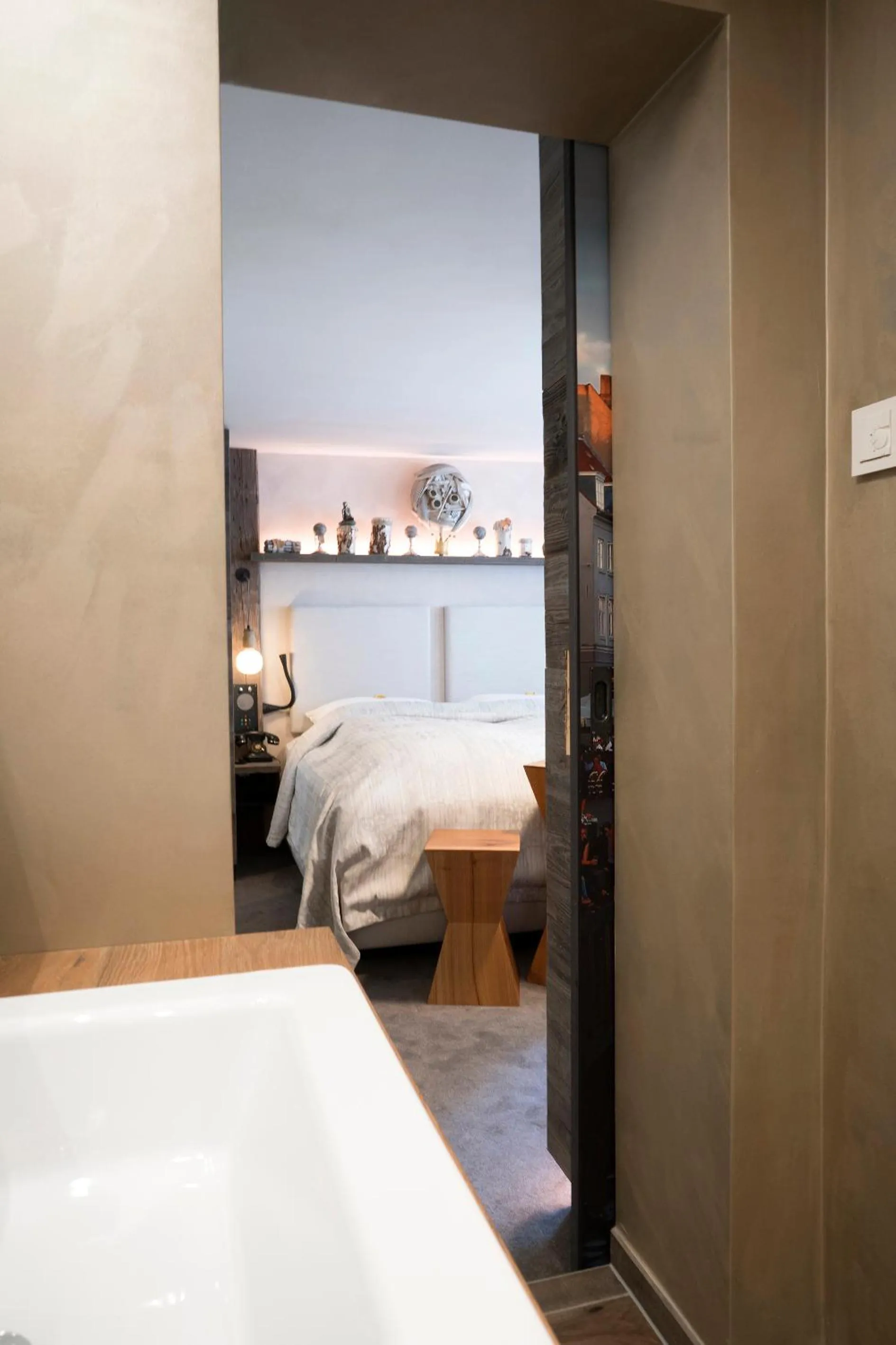 Bathroom, Bed in Boutique Hotel im Auracher Löchl