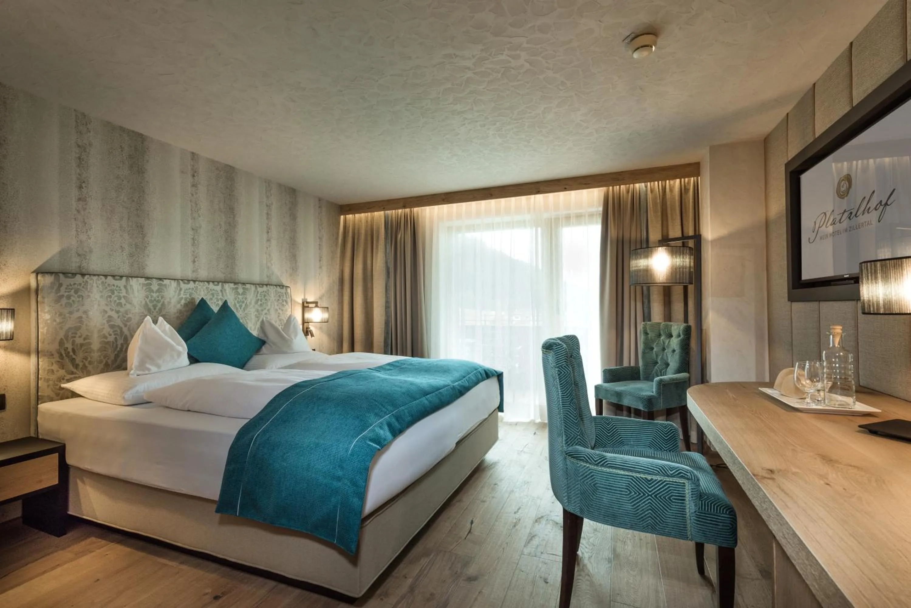 Photo of the whole room, Bed in Platzlhof - Mein Hotel im Zillertal