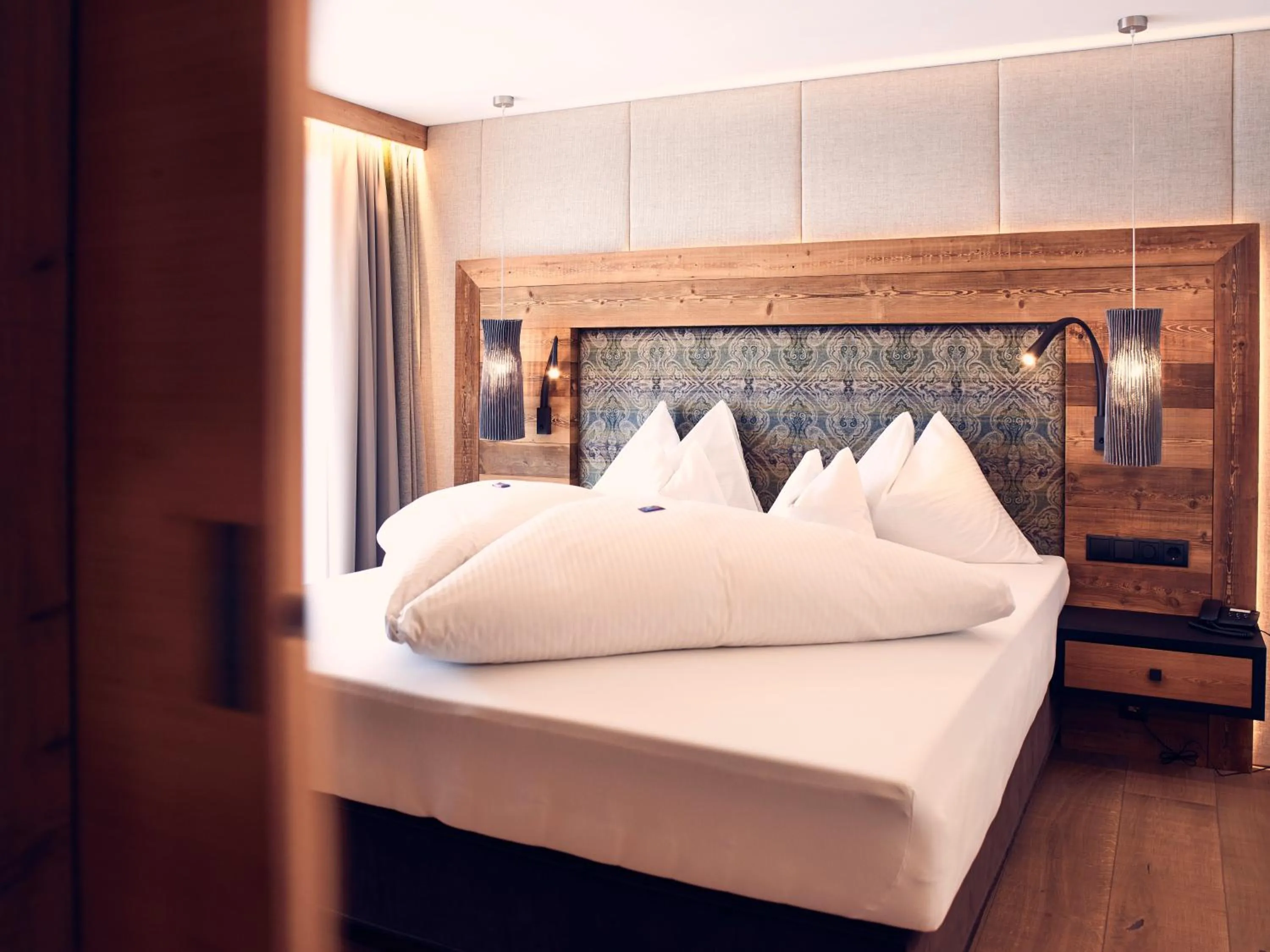 Photo of the whole room, Bed in Platzlhof - Mein Hotel im Zillertal