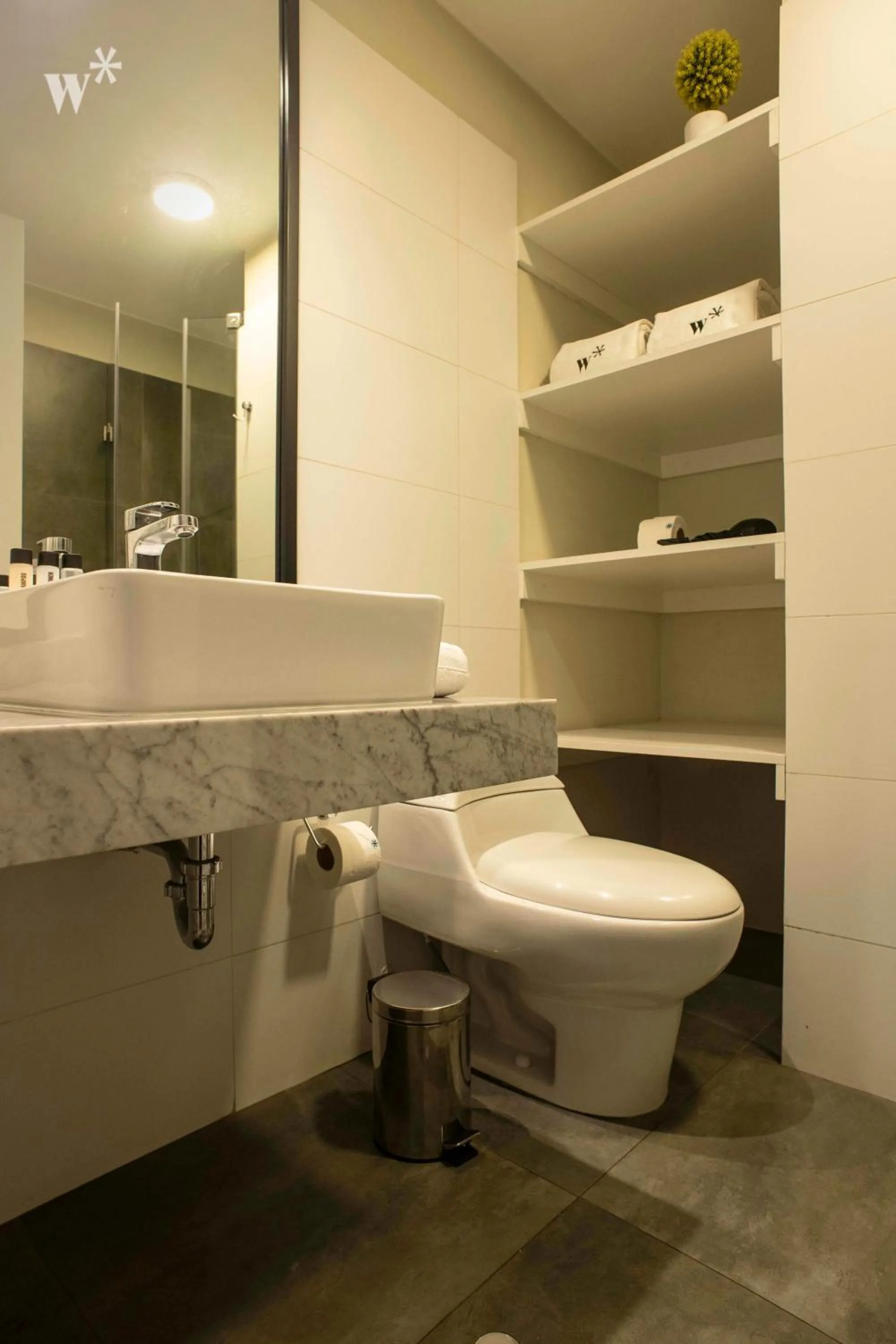 Toilet in Osma by Wynwood House