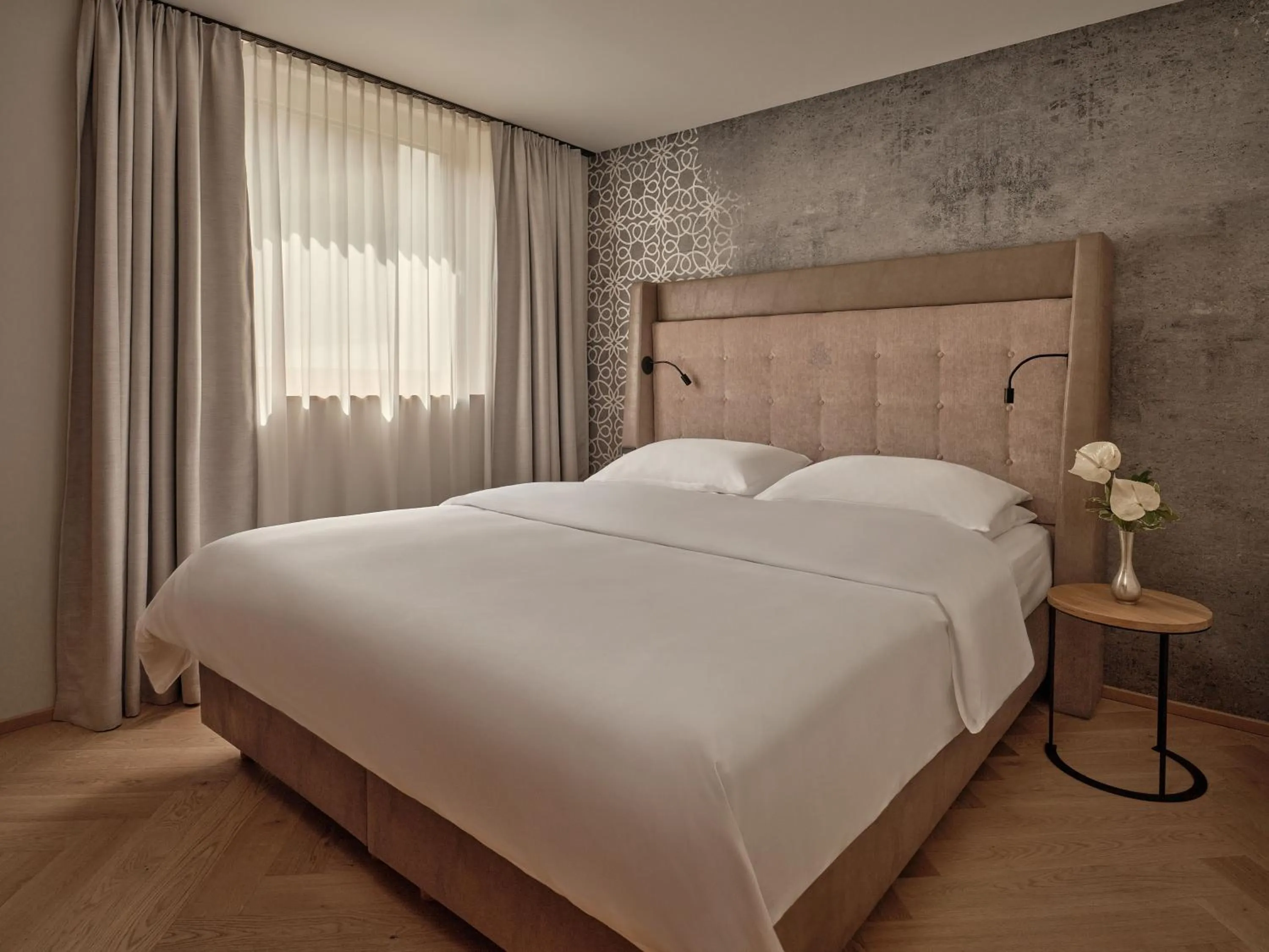 Bedroom, Bed in DAS EDELWEISS - Salzburg Mountain Resort