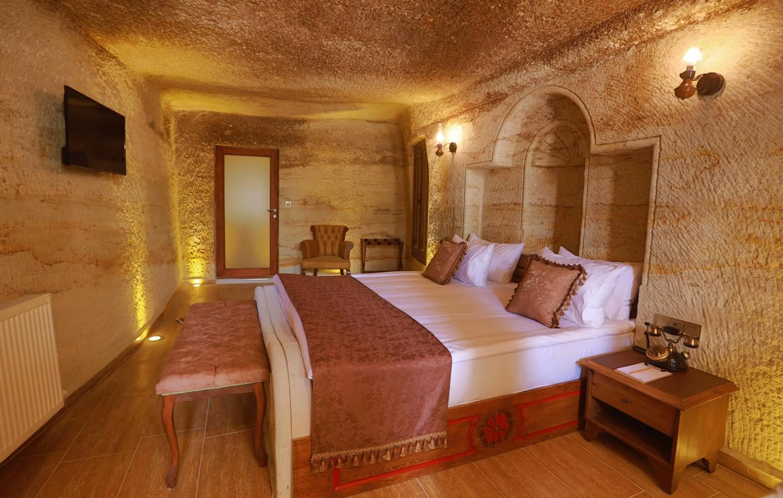 Bed in Ada Cave Suites