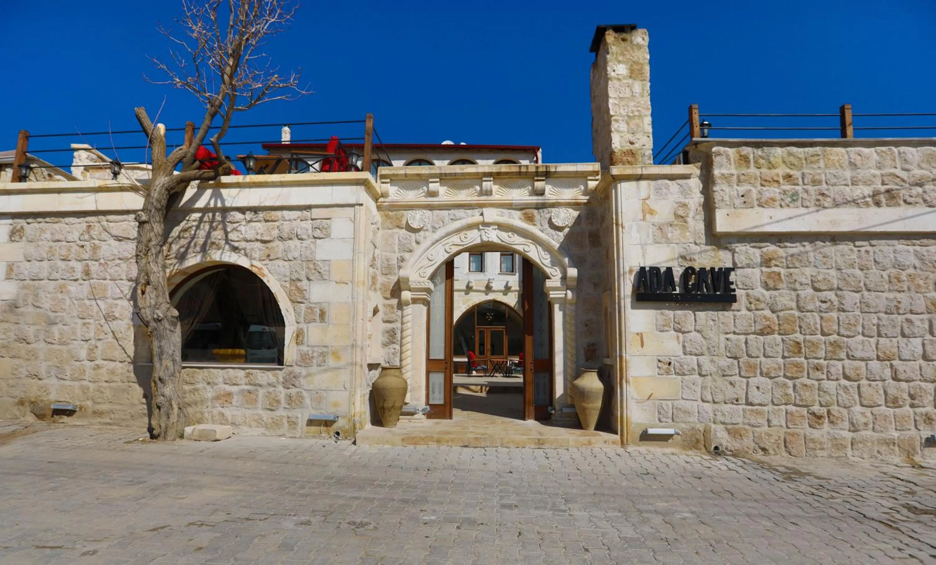 Property building in Ada Cave Suites