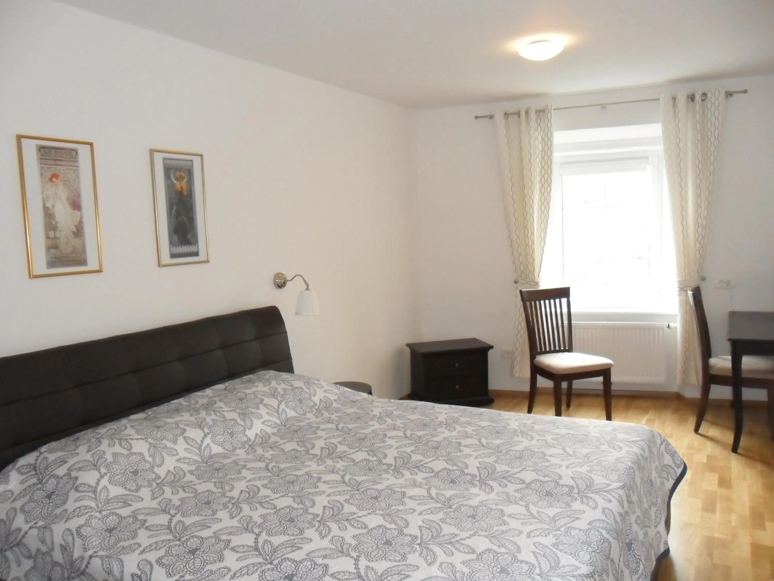 Bed in Kollmann Rooms and Apartments