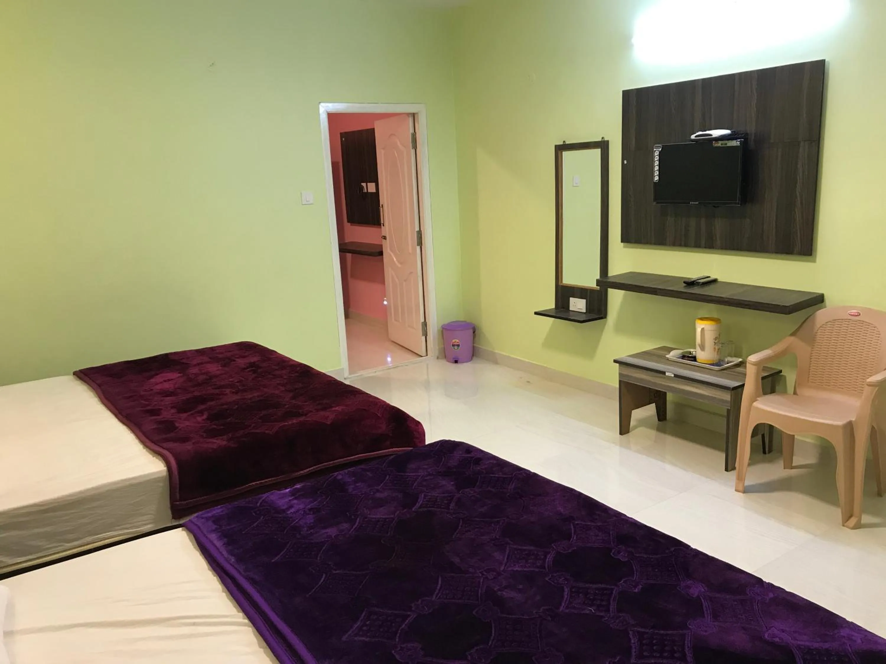 Bed in HAPPYSTAY rooms and cottages