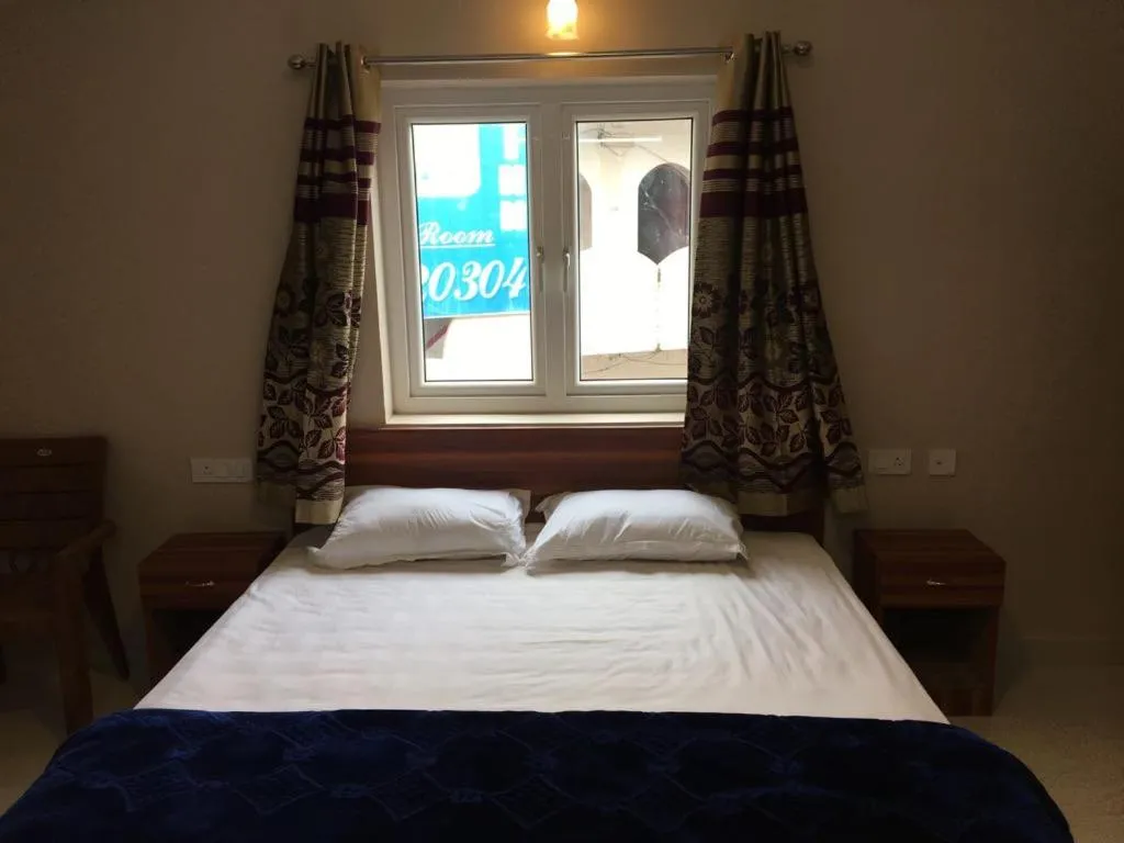 Bed in HAPPYSTAY rooms and cottages