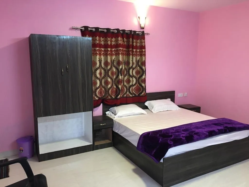 Bed in HAPPYSTAY rooms and cottages