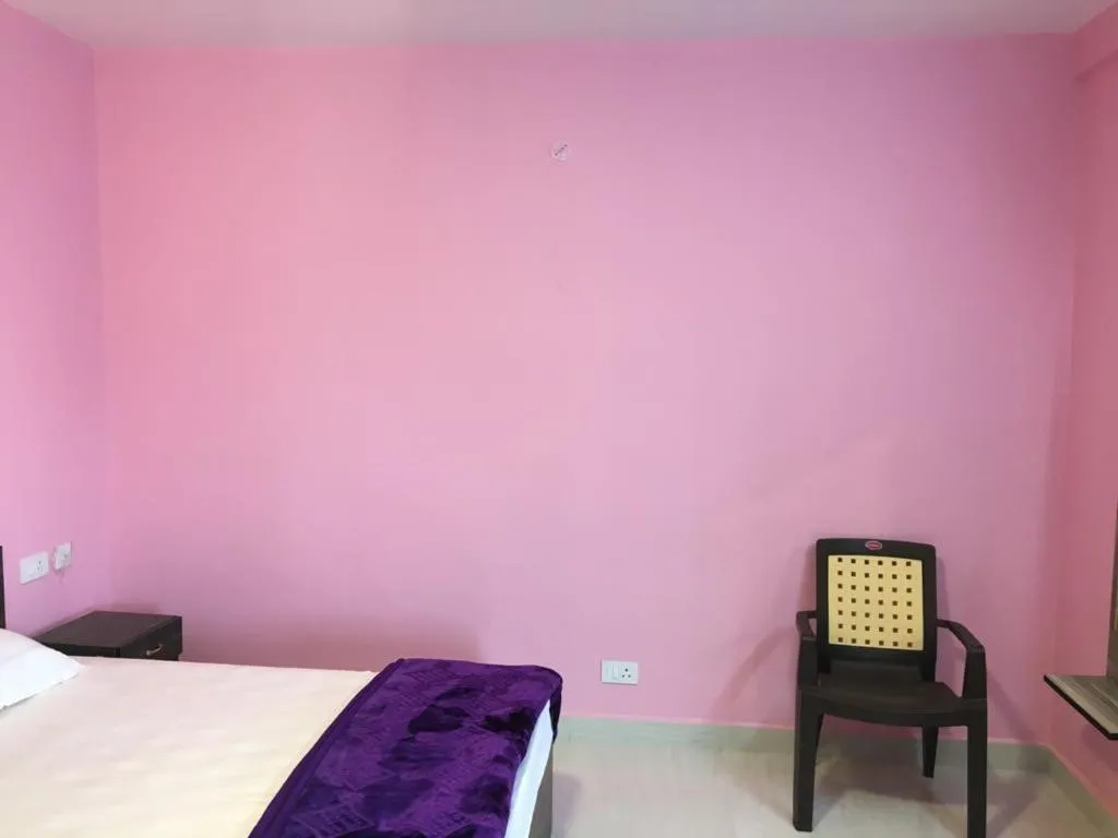 Bed in HAPPYSTAY rooms and cottages