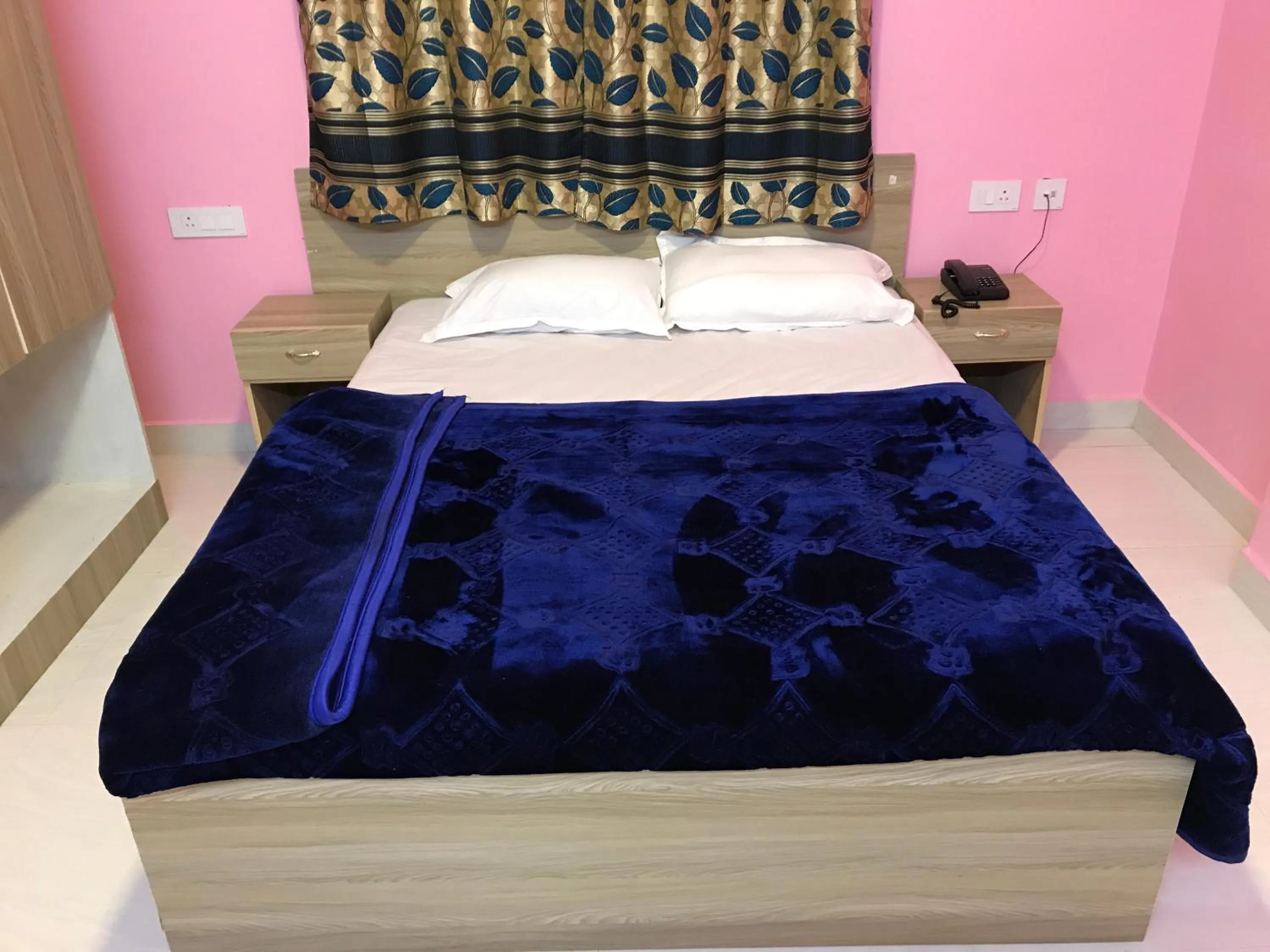 Bed in HAPPYSTAY rooms and cottages