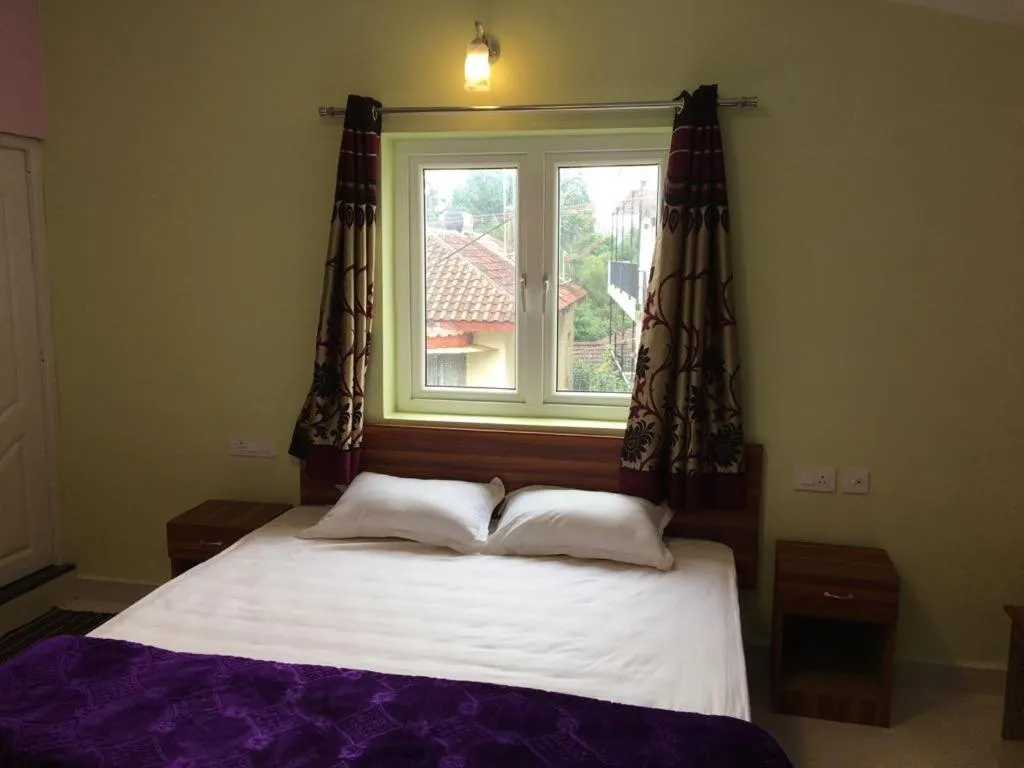 Bed in HAPPYSTAY rooms and cottages