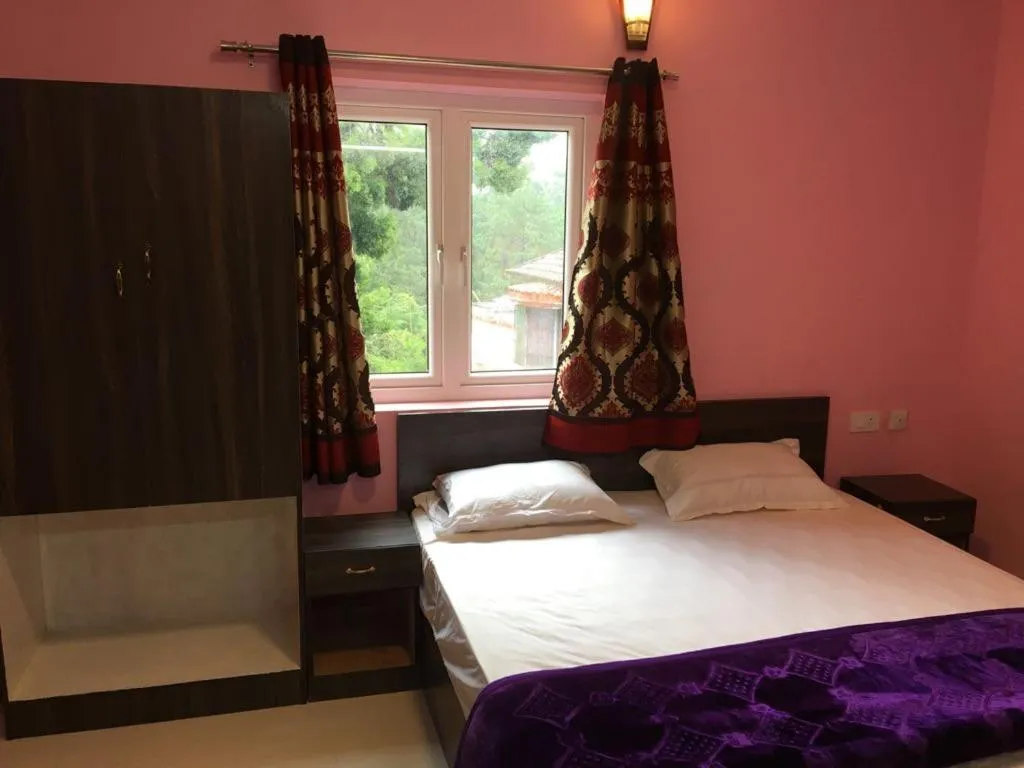 Bed in HAPPYSTAY rooms and cottages