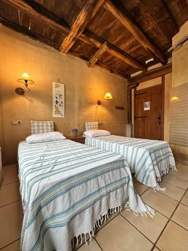 Bed in Casa Rural Ecológica Kaaño Etxea