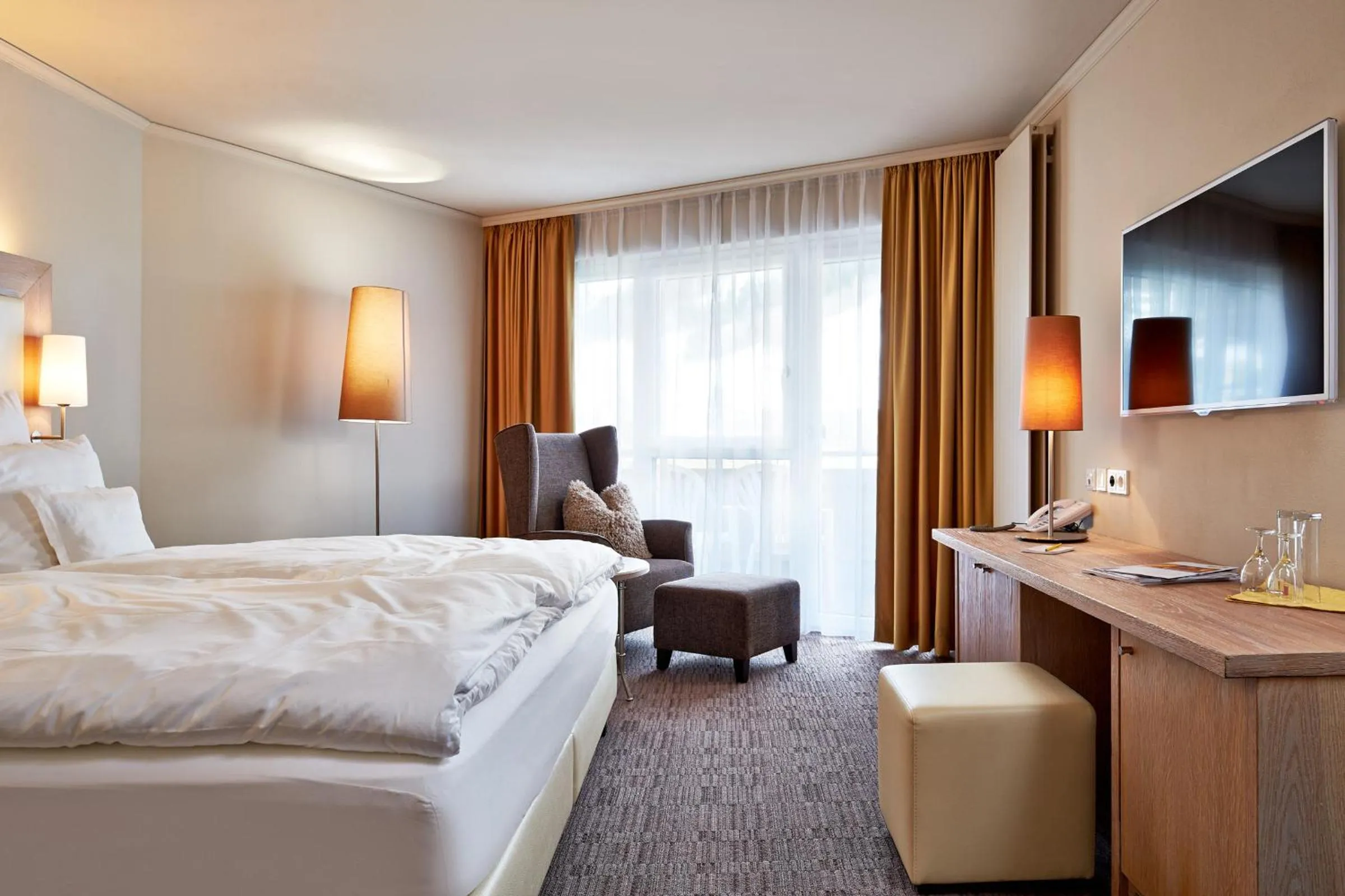 Photo of the whole room, Bed in Hotel Barbarahof 4 stars Superior - Adults Only "soft" from 10 years - Skibus-stop