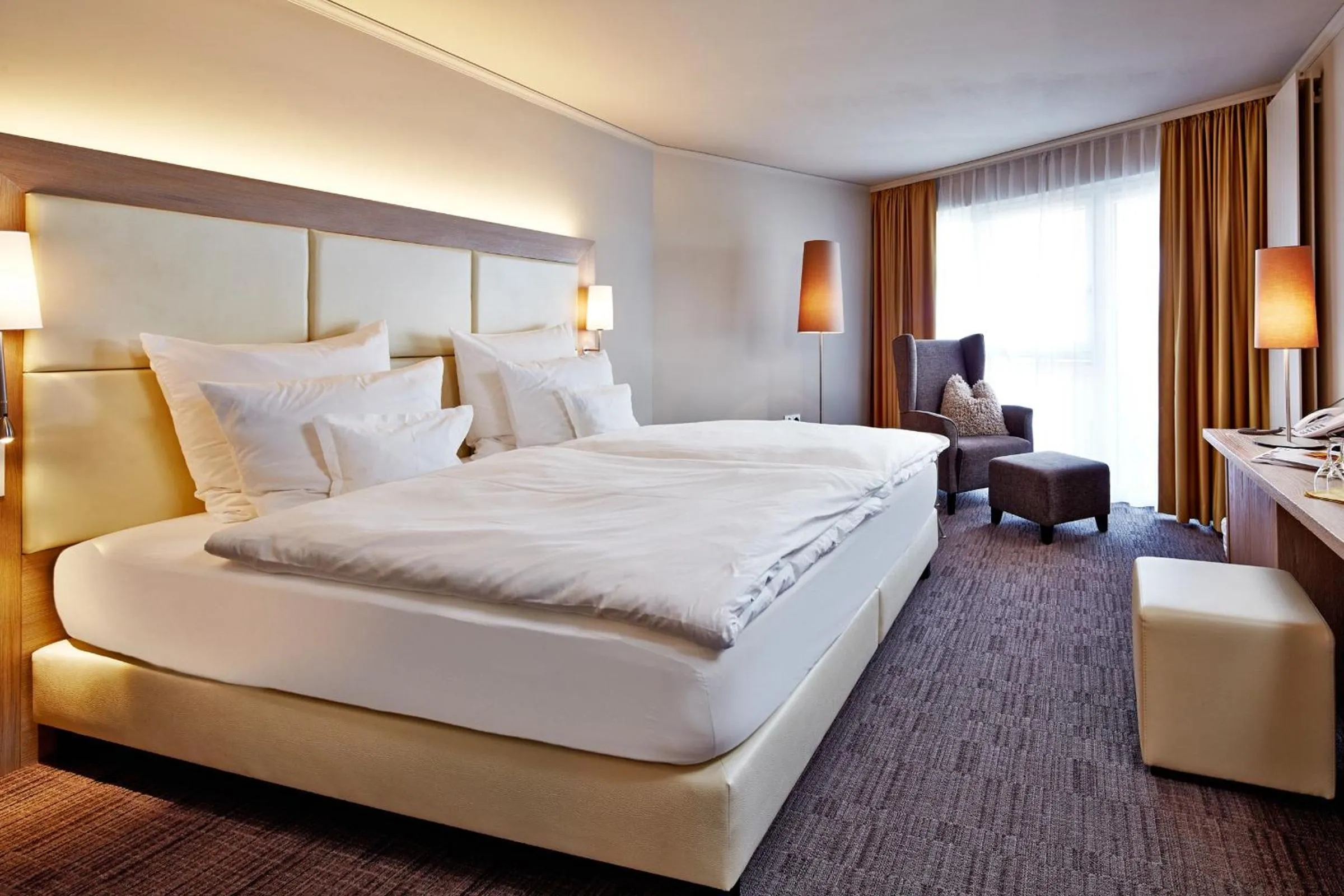 Photo of the whole room, Bed in Hotel Barbarahof 4 stars Superior - Adults Only "soft" from 10 years - Skibus-stop