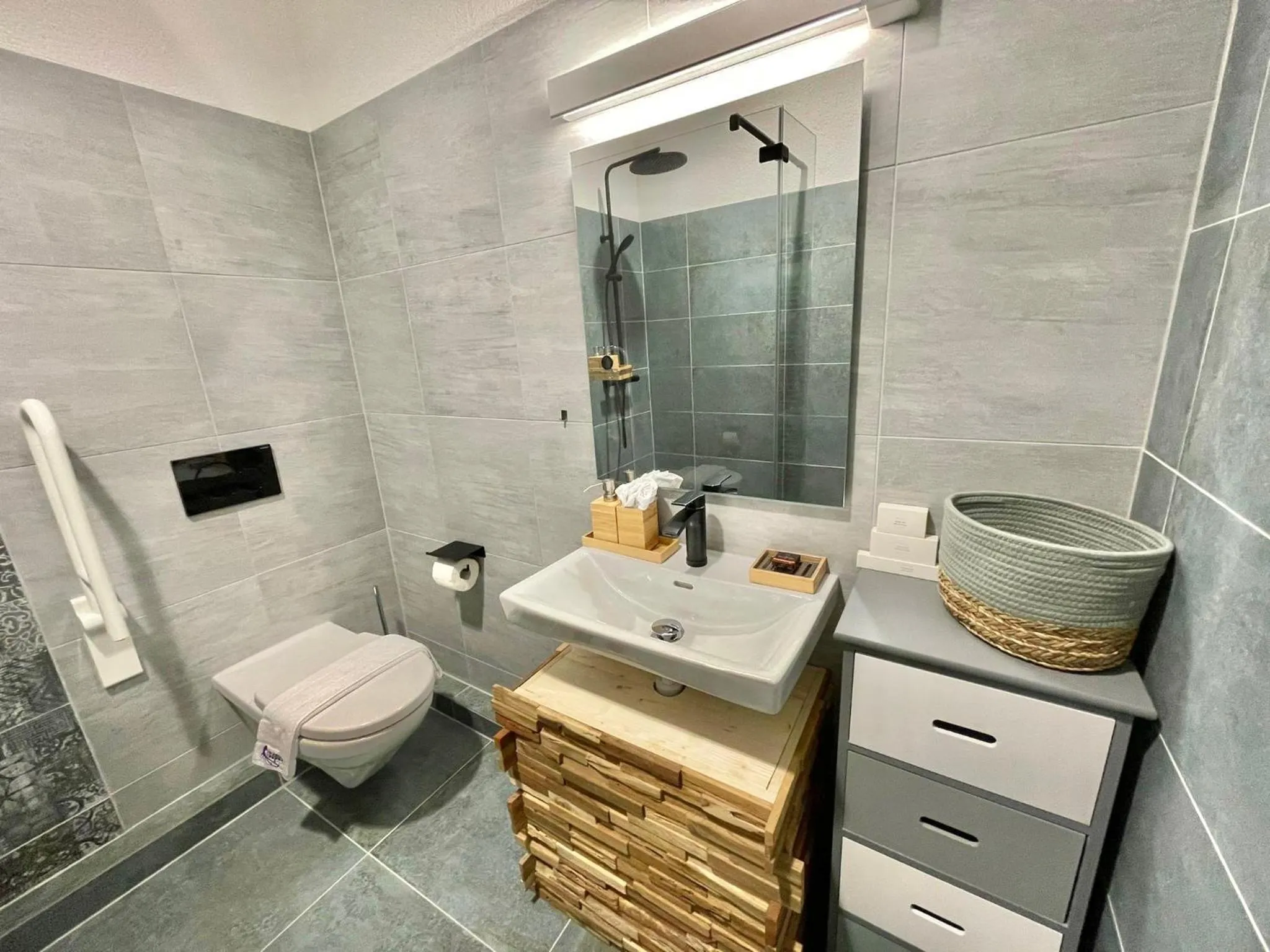 Bathroom in The 5 Continents I by Stay Swiss