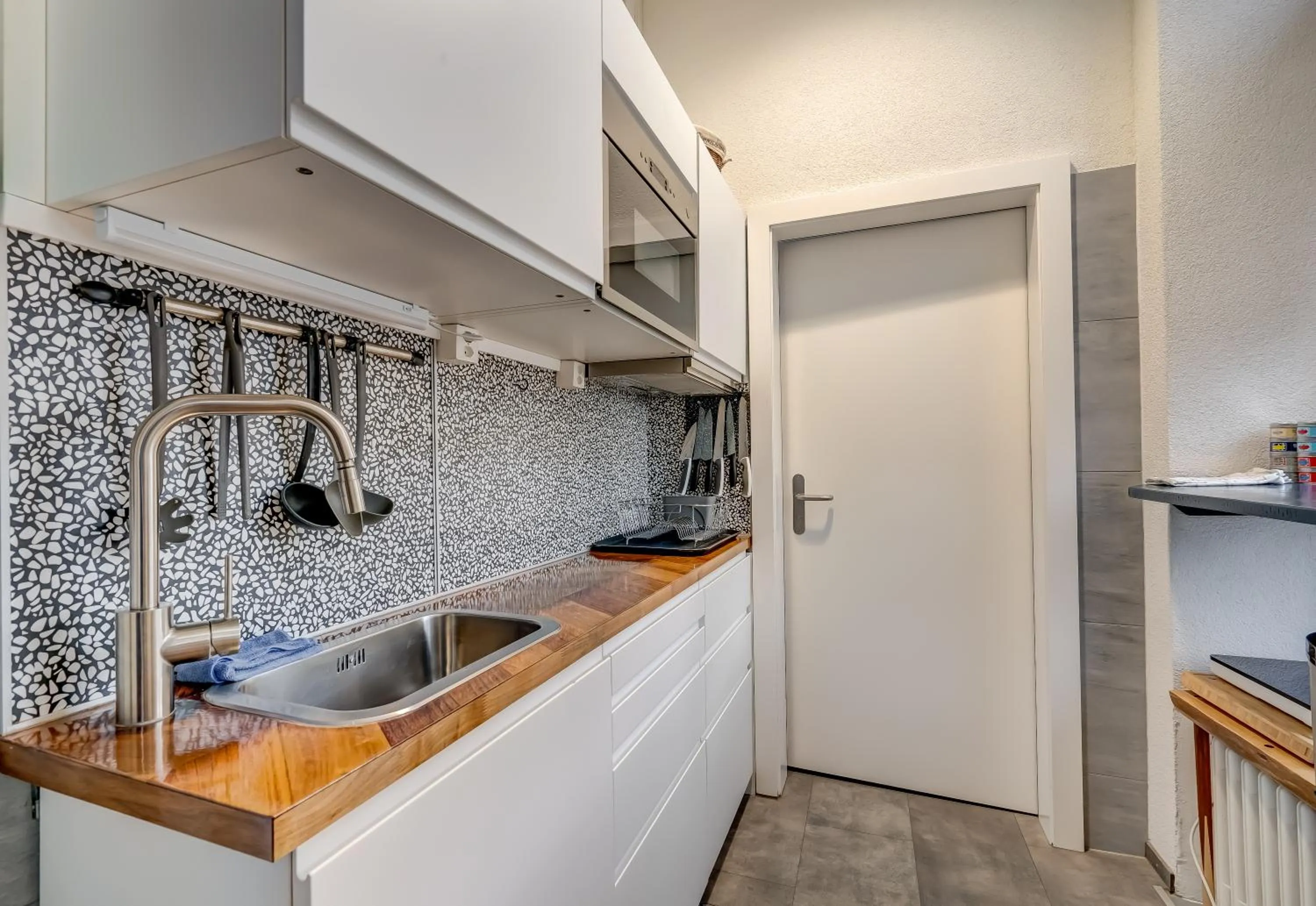 Kitchen or kitchenette in The 5 Continents I by Stay Swiss