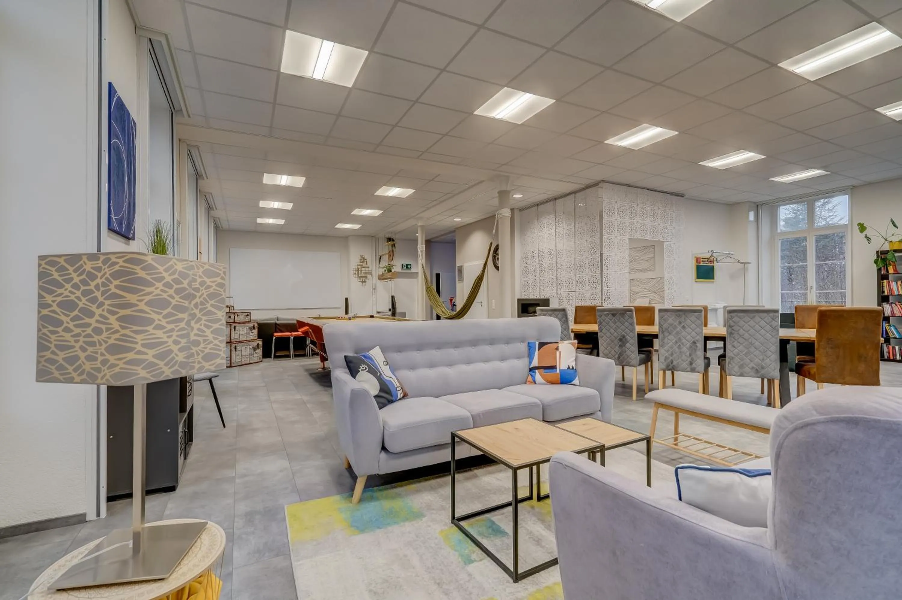 Living room in The 5 Continents I by Stay Swiss