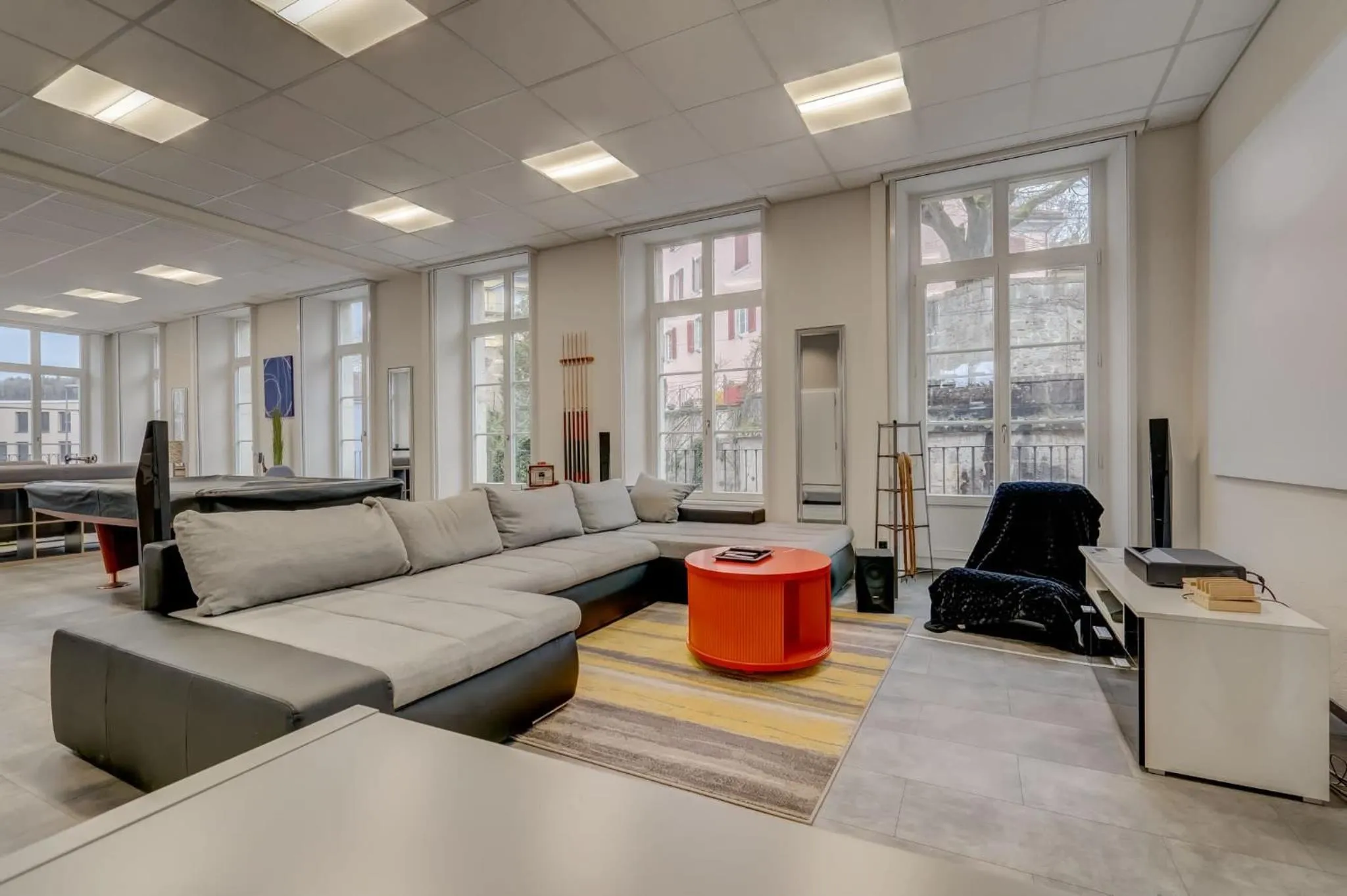 Living room in The 5 Continents I by Stay Swiss