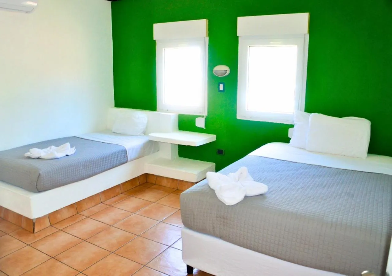 Bed in Las Veraneras Villas & Resort