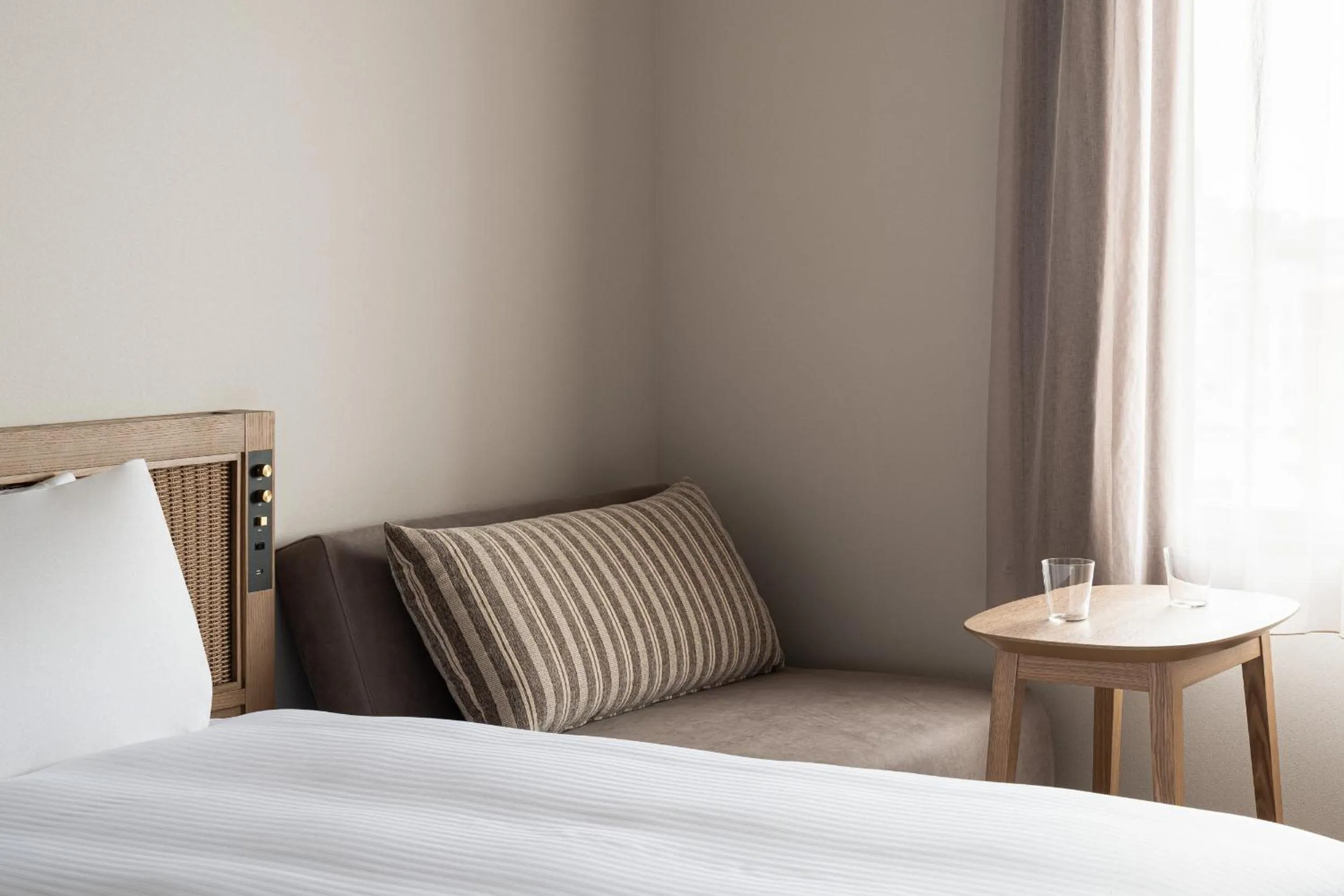 Photo of the whole room, Bed in Nest Hotel Naha Kumoji