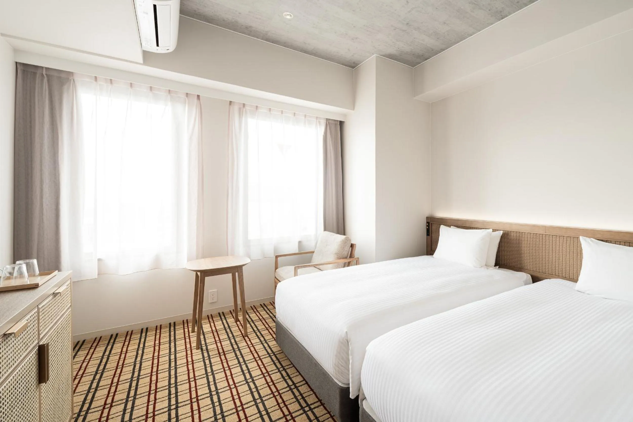 Photo of the whole room, Bed in Nest Hotel Naha Kumoji