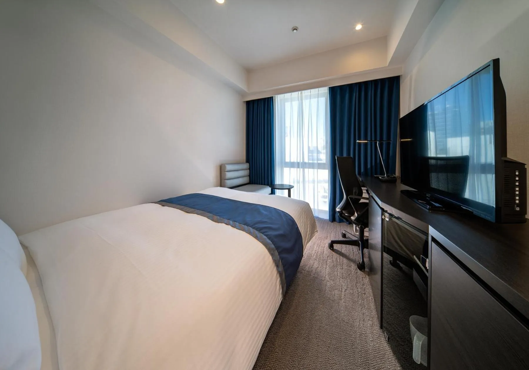 Bed in DEL style Ikebukuro Higashiguchi by Daiwa Roynet Hotel