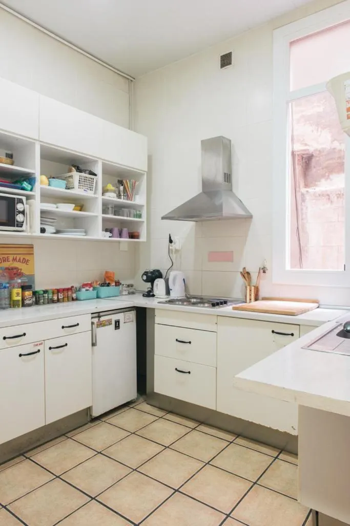 Communal kitchen in Soul Backpackers Barcelona