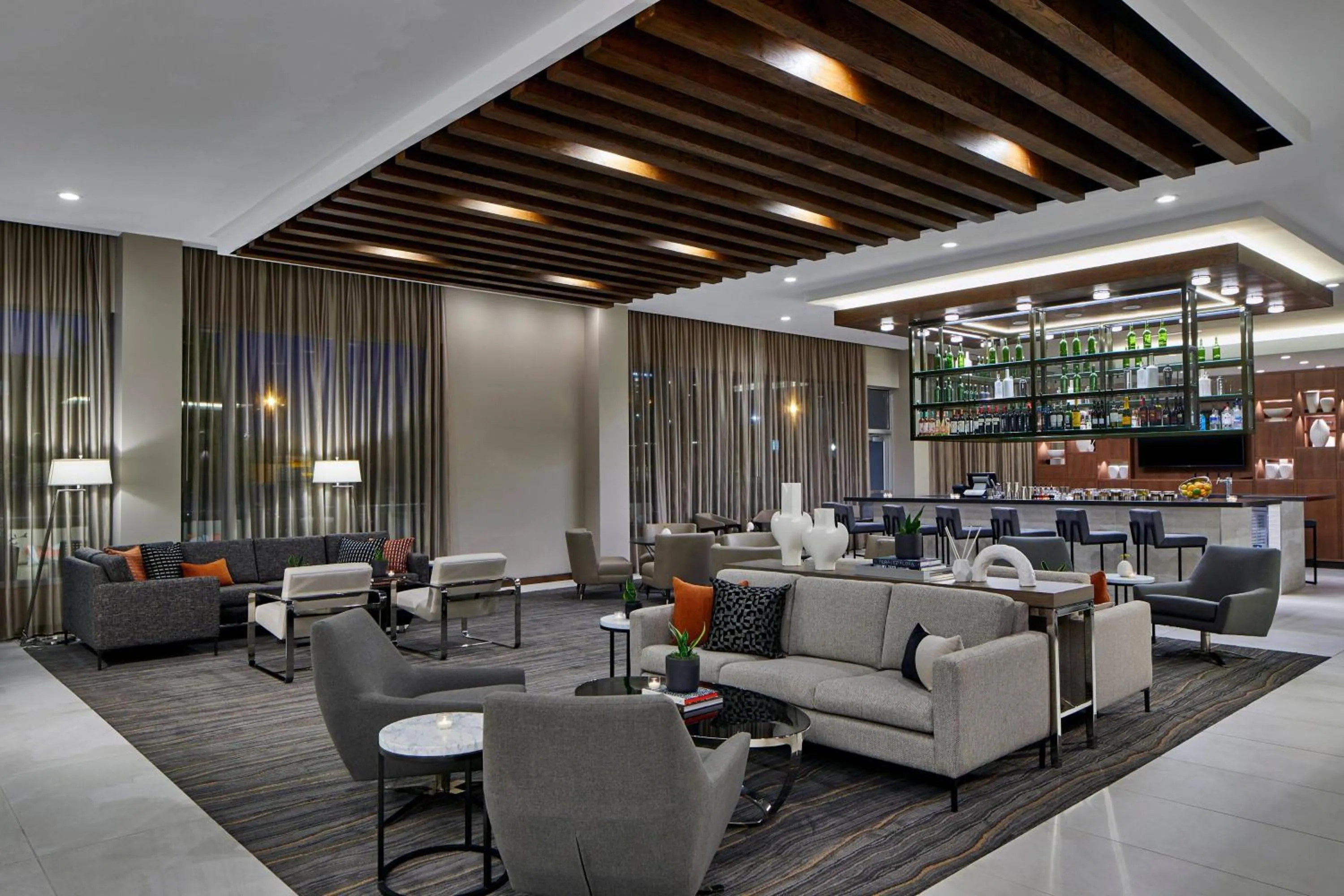 Lounge or bar in AC Hotel by Marriott Tuscaloosa Downtown