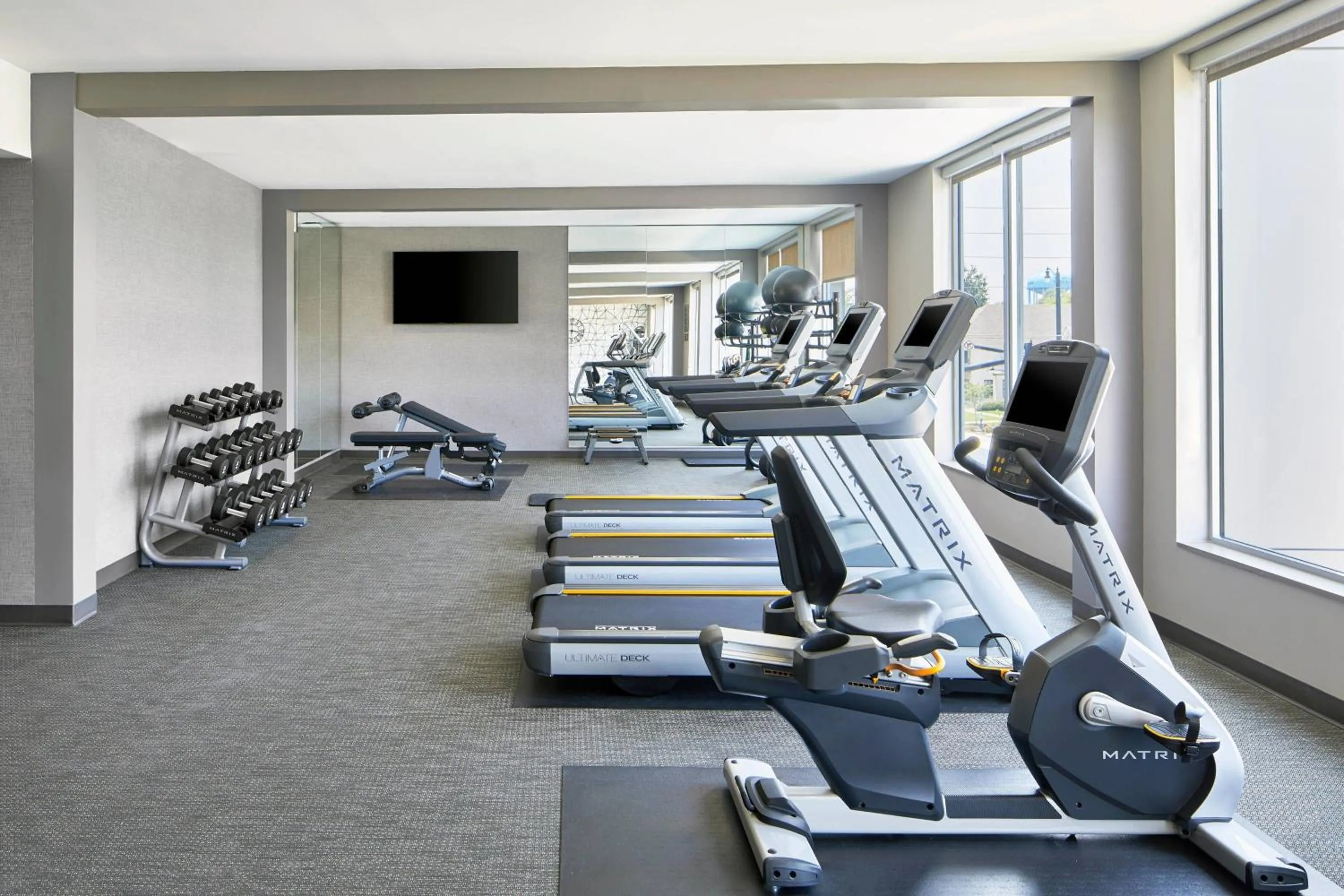 Fitness centre/facilities in AC Hotel by Marriott Tuscaloosa Downtown