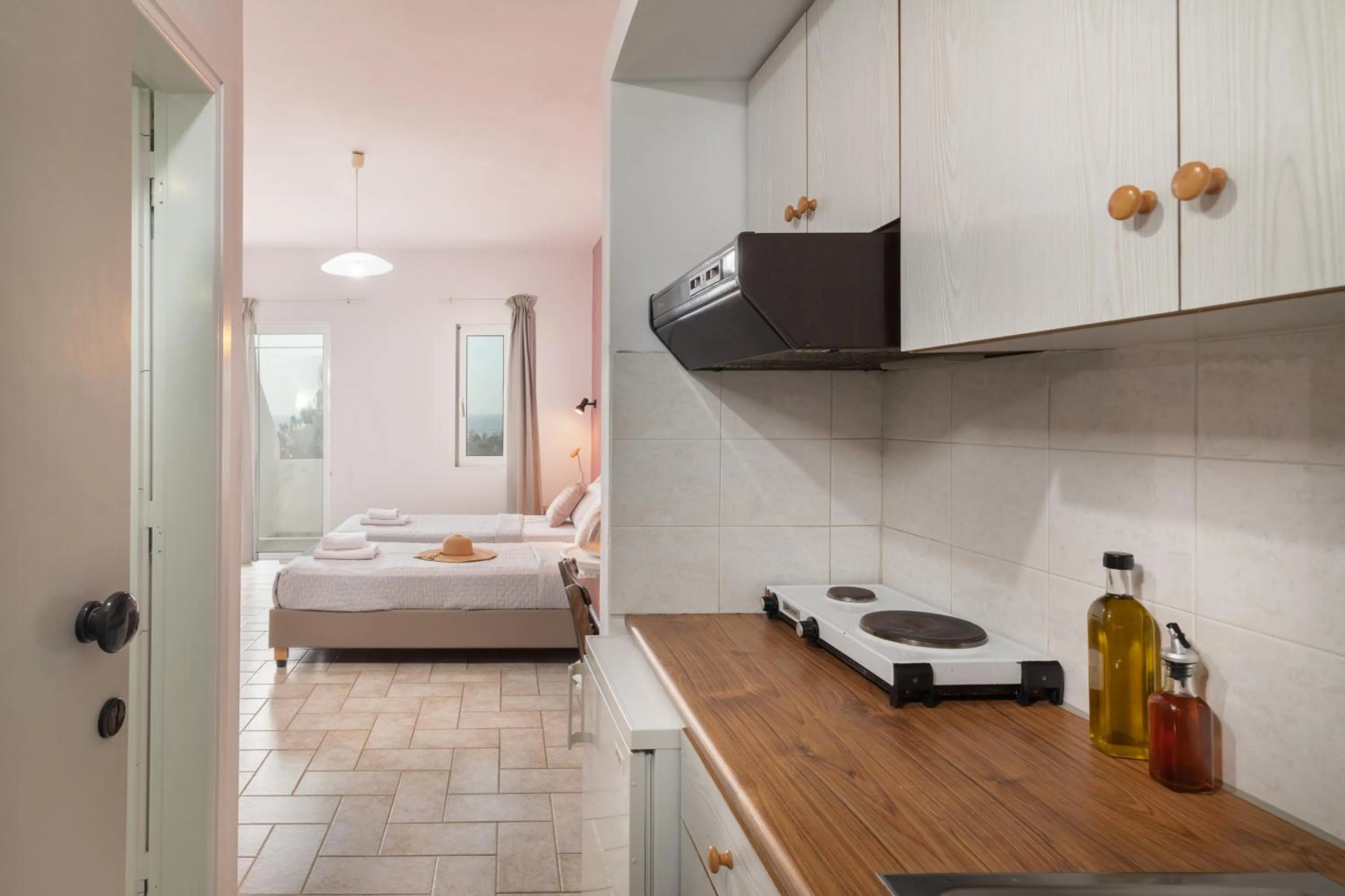 Kitchen or kitchenette, Bed in Aegean Apartments