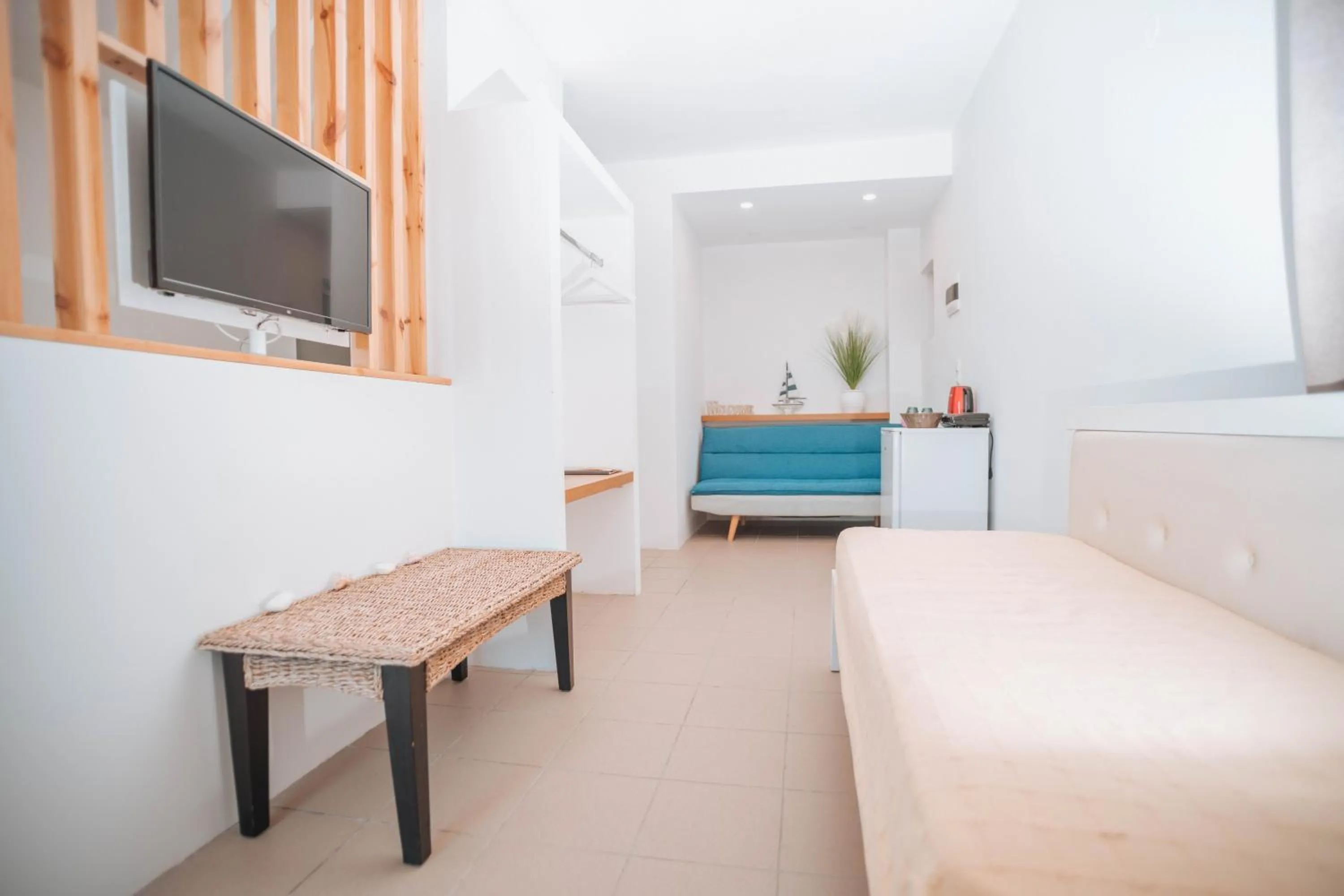 Living room, Bed in Aegean Apartments