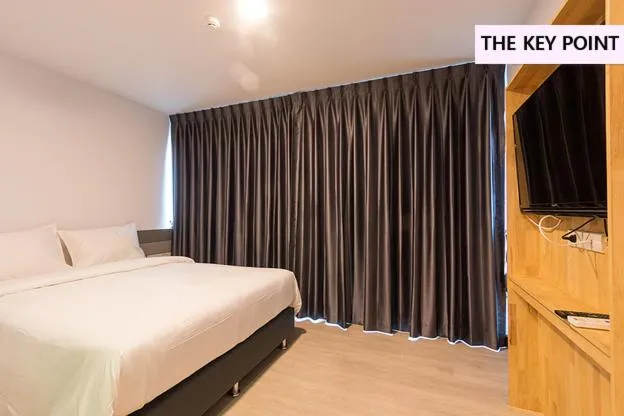 Bed in The Key Point Hotel