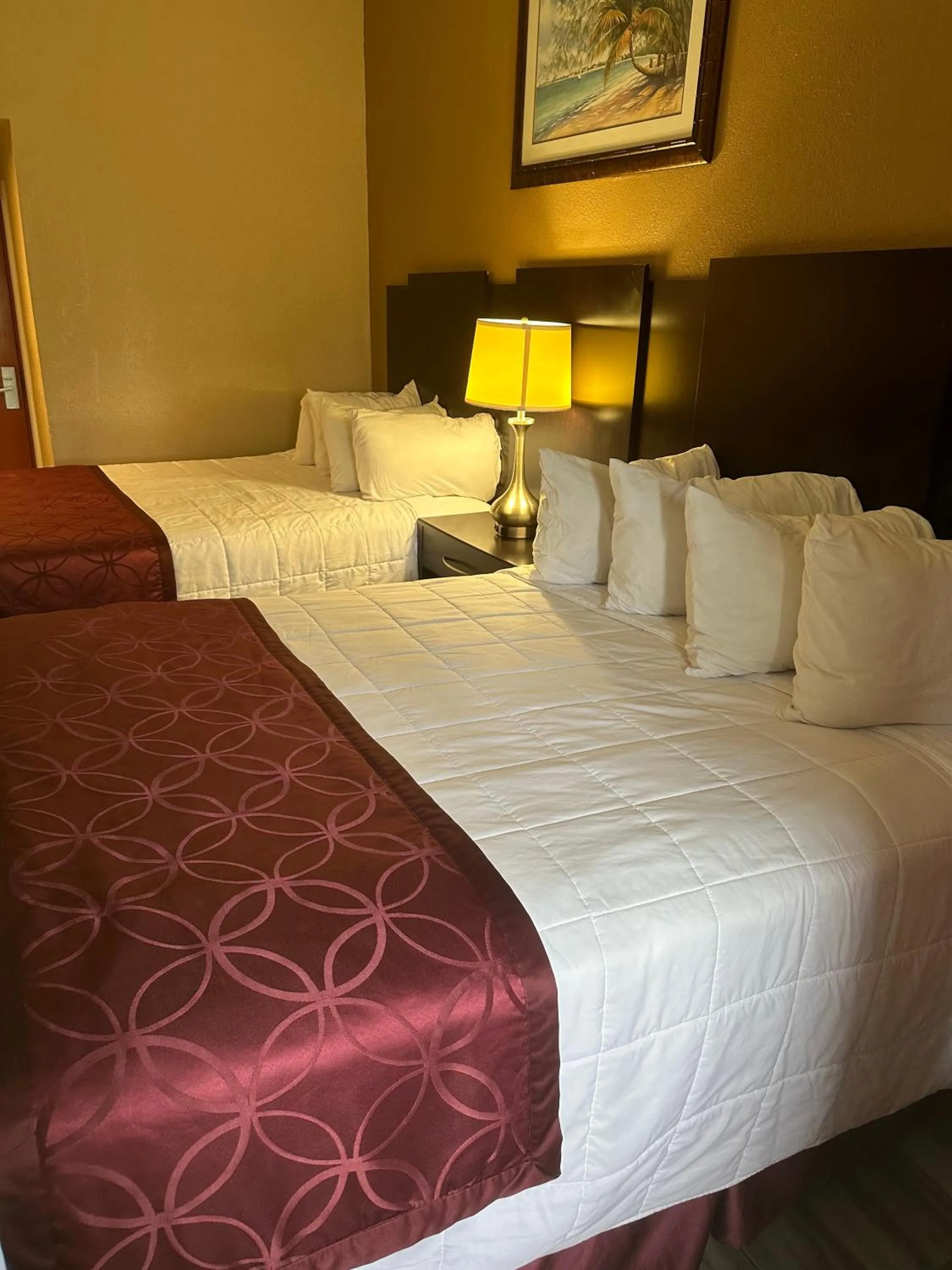 Bed in A-1 Budget Motel