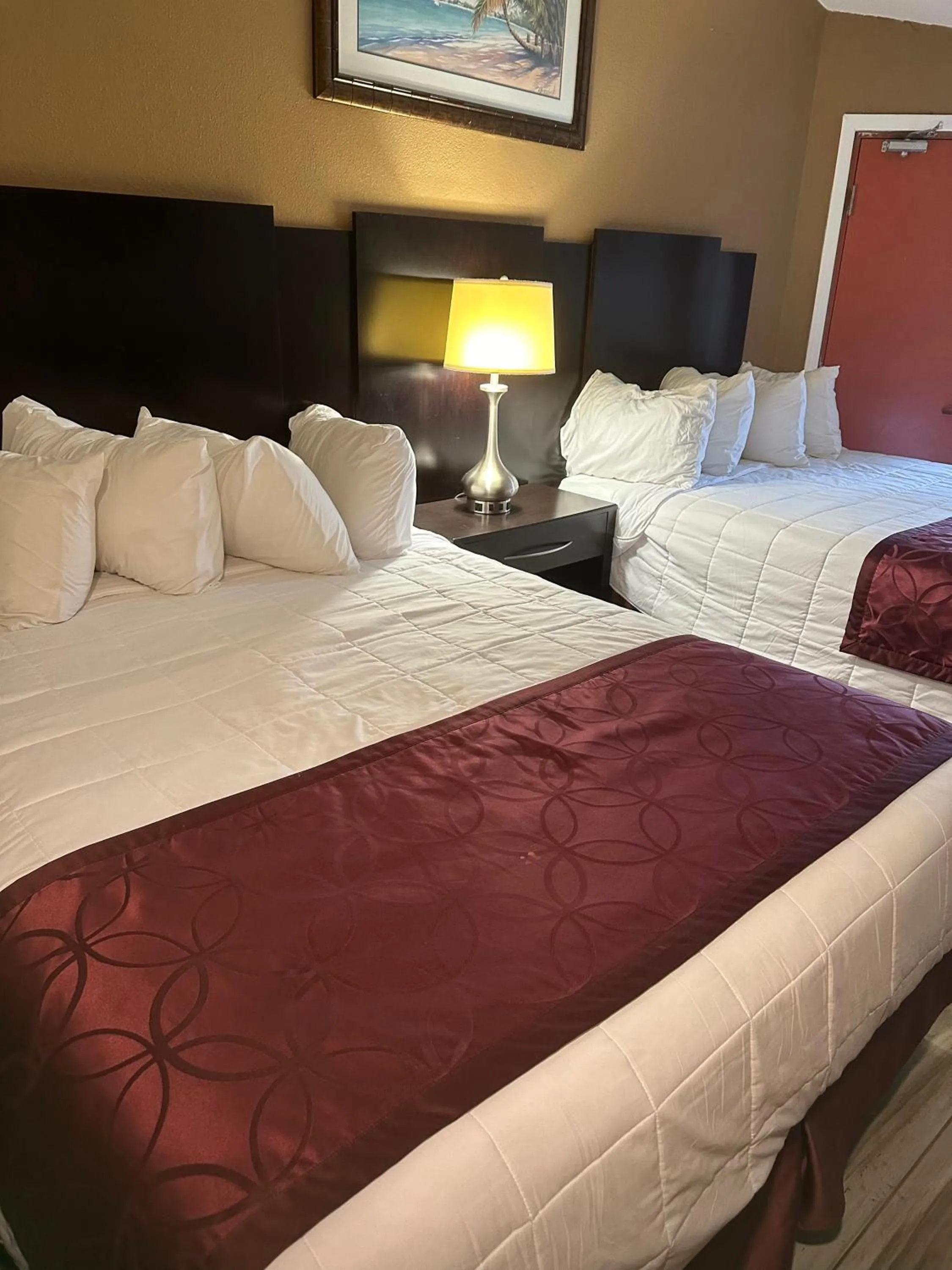 Bed in A-1 Budget Motel