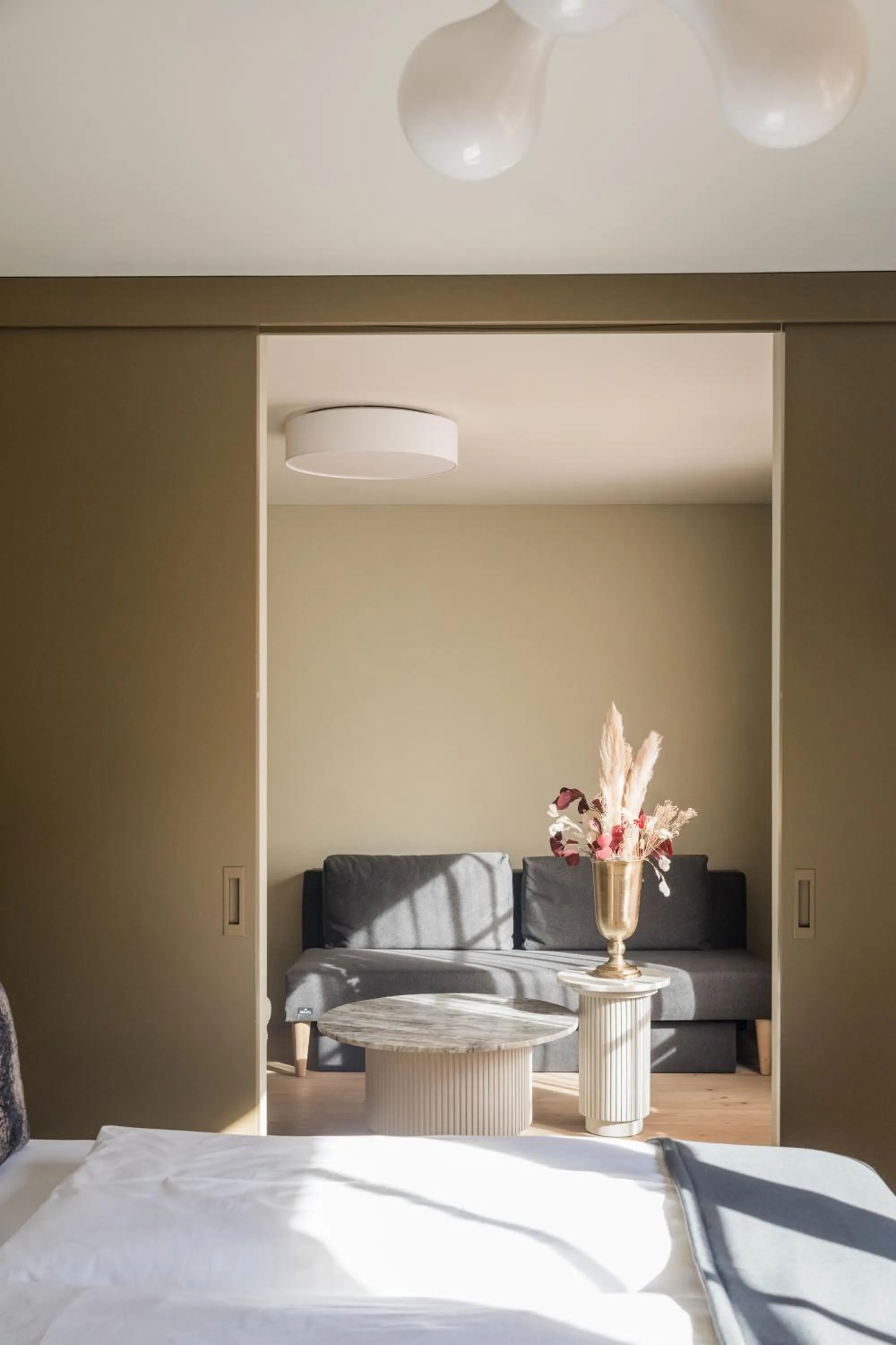 Living room, Bed in Raffl's Tyrol Hotel