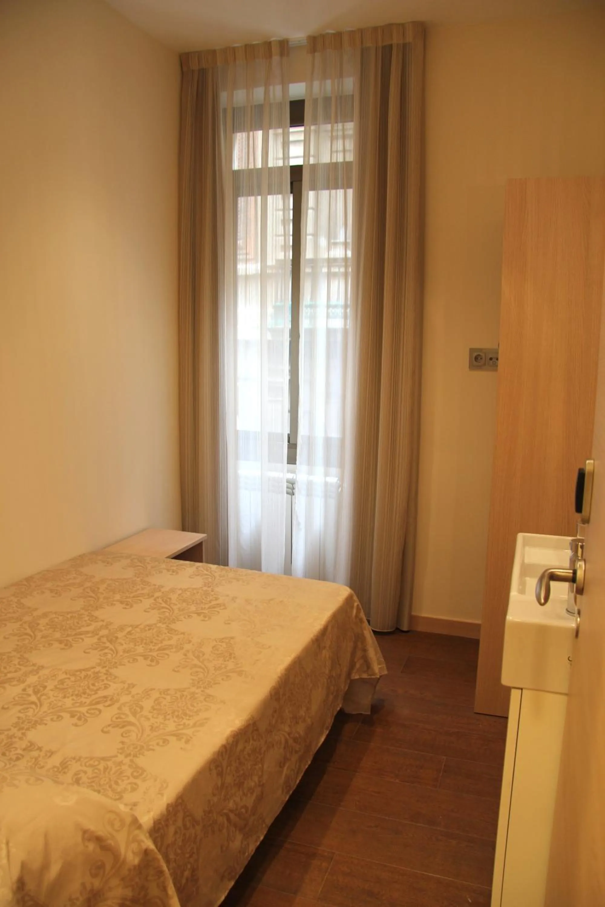 Bed in Hostal Excellence