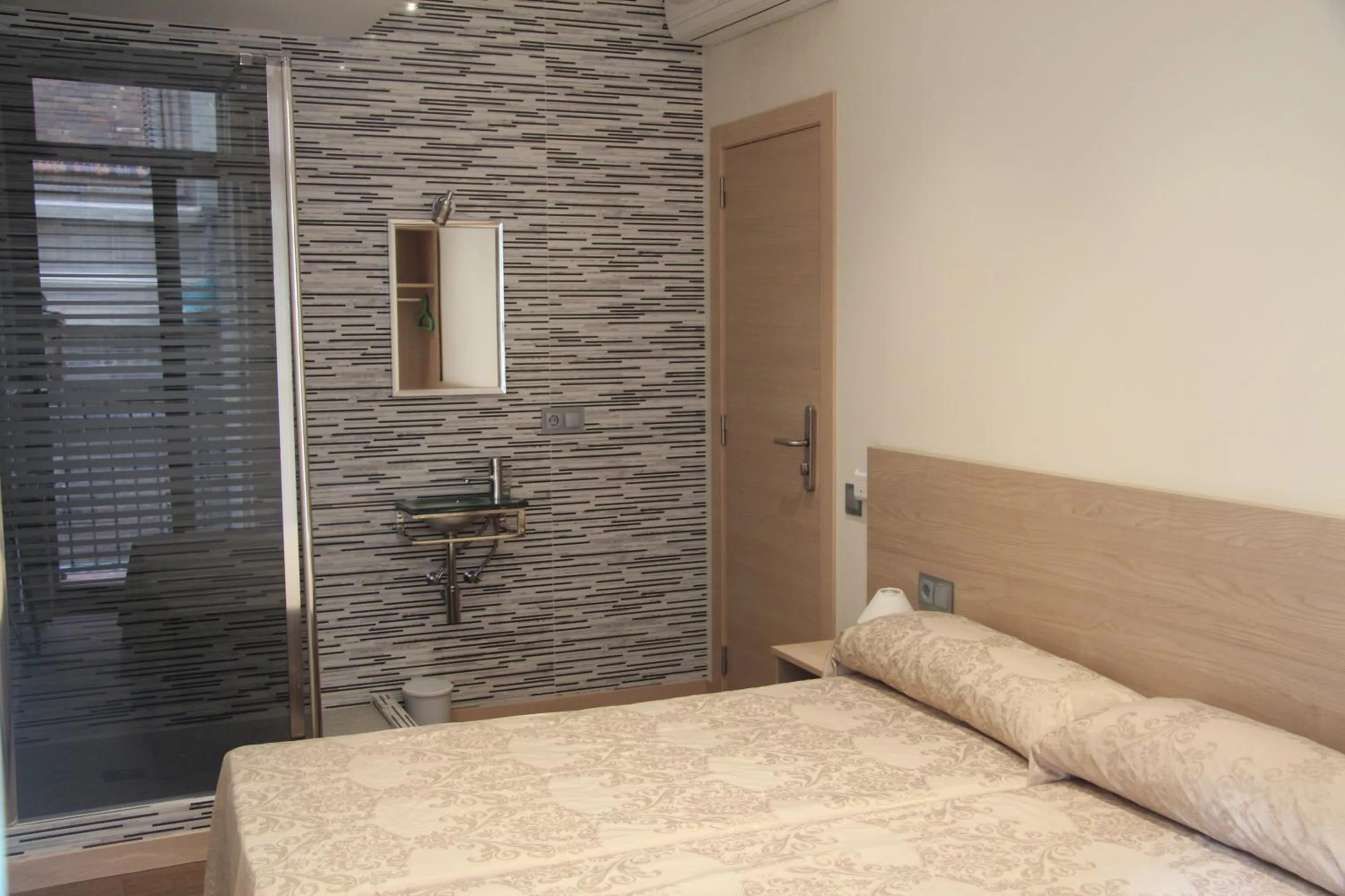 Bed in Hostal Excellence