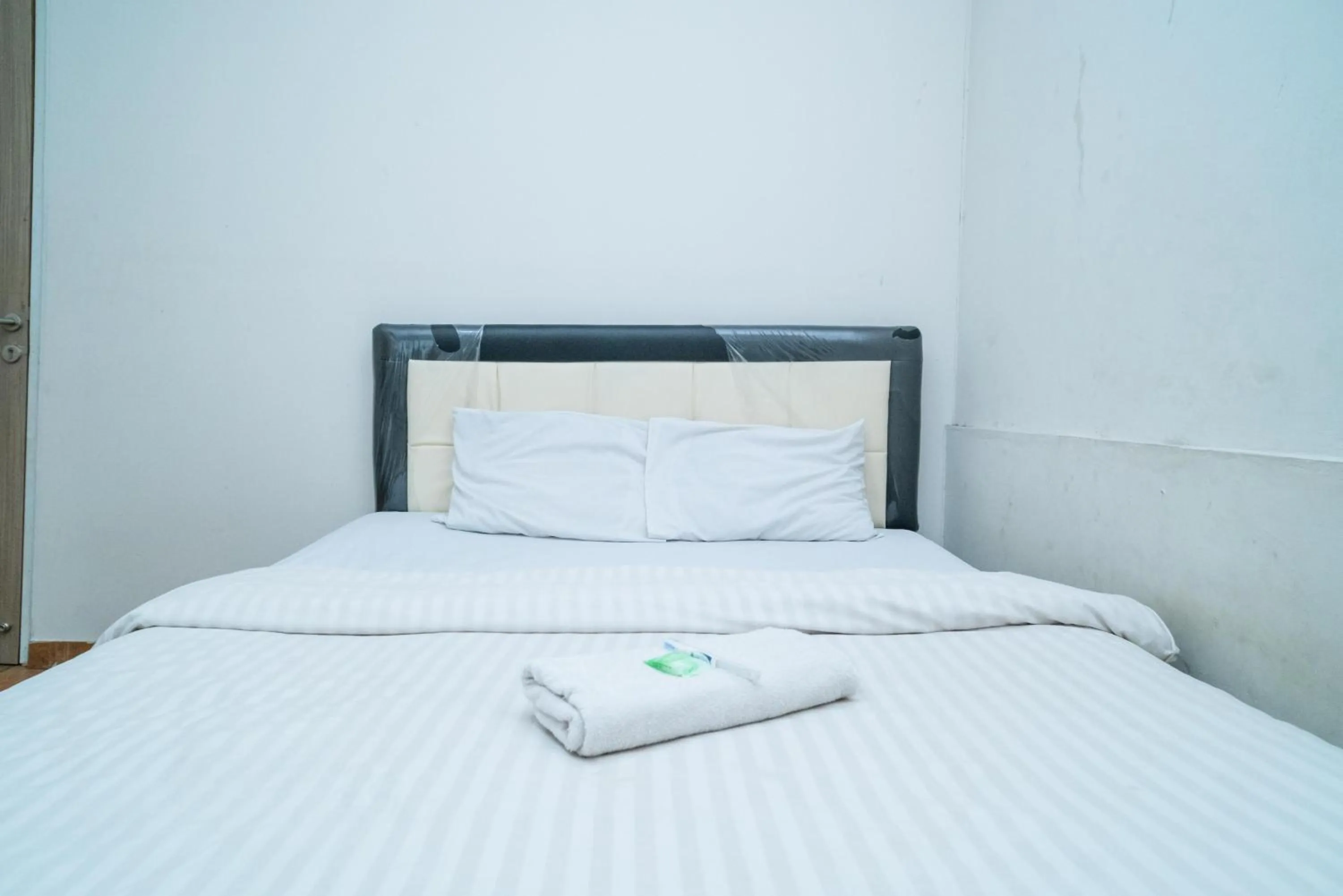 Bed in 77 Guest House Serpong Mitra RedDoorz