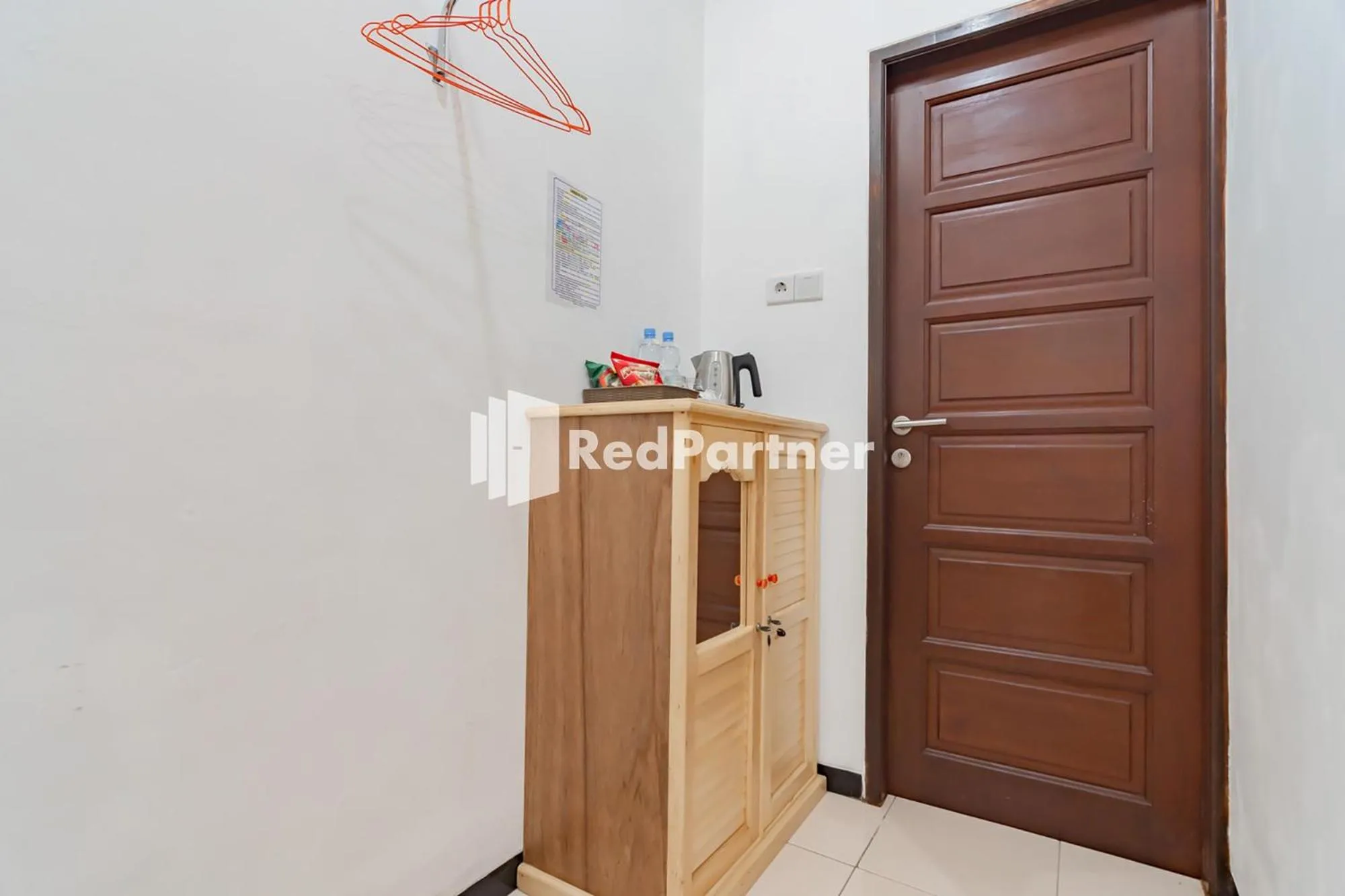 Bedroom in Langkar Guest House Syariah Mitra RedDoorz