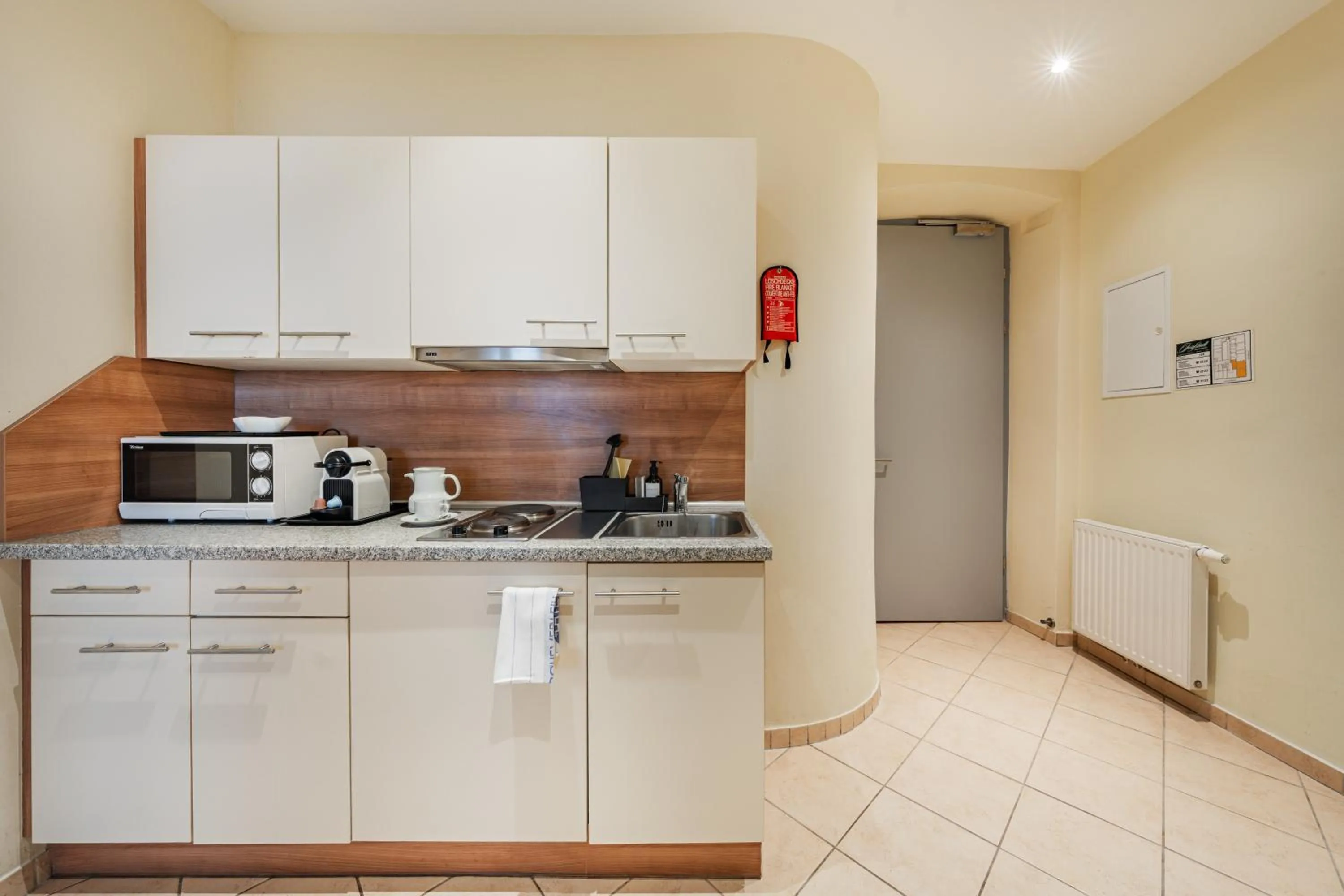 kitchen in Serviced Apartments Josefstadt City