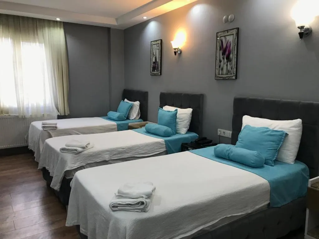 Bed in Grand Atakum Boutıque Hotel