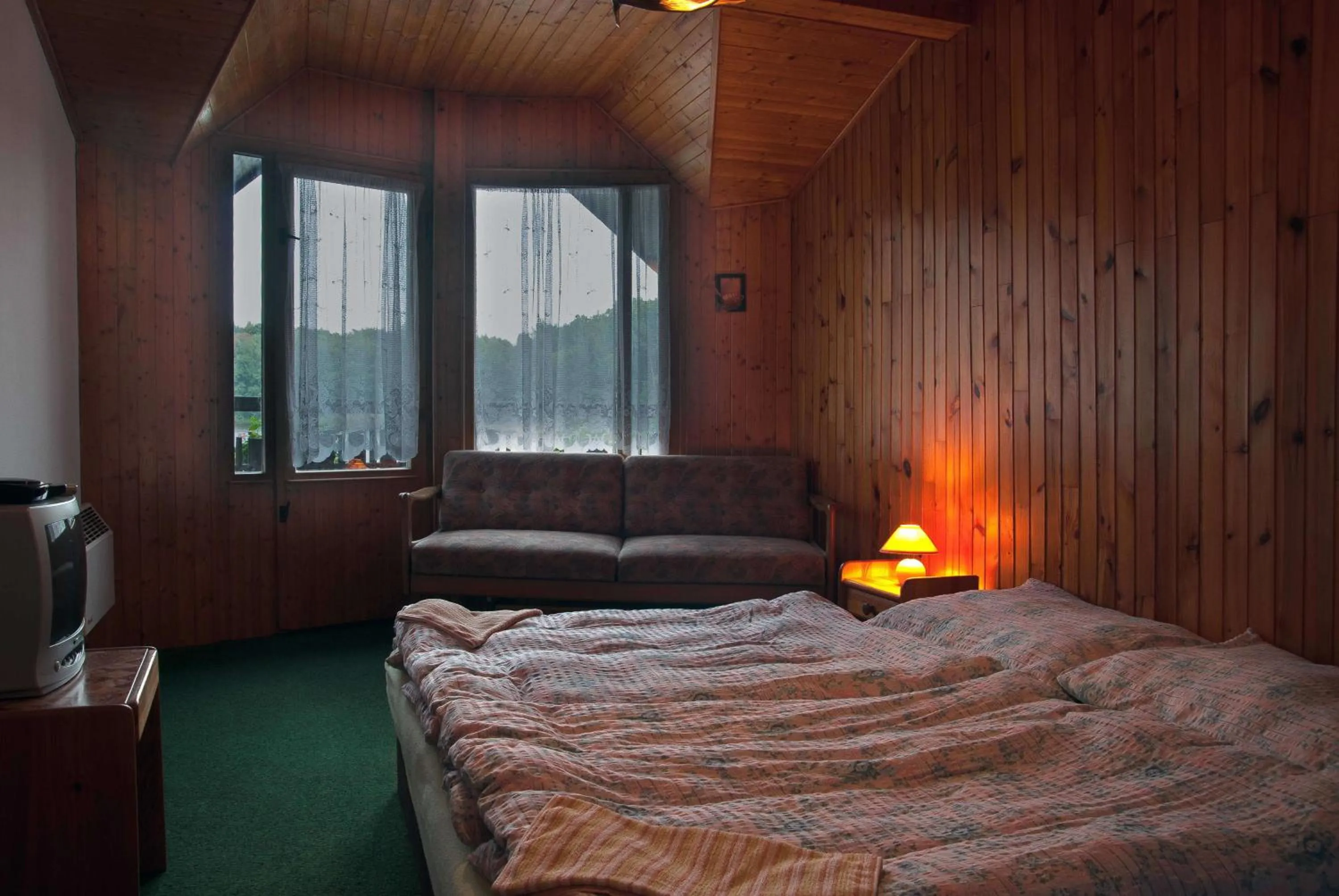 Bed in Lovecký hotel Jívák