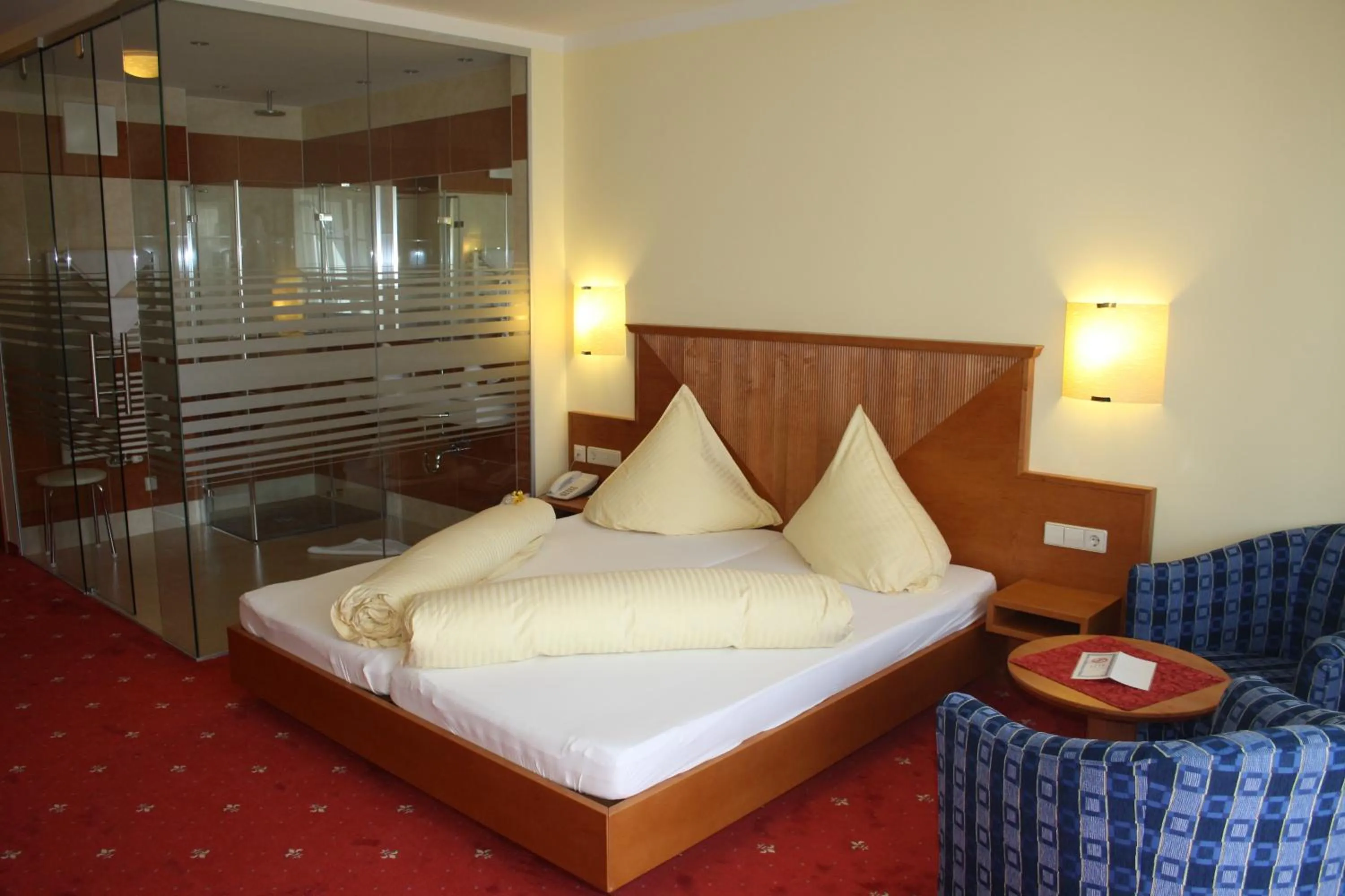 Decorative detail, Bed in Posthotel Radstadt