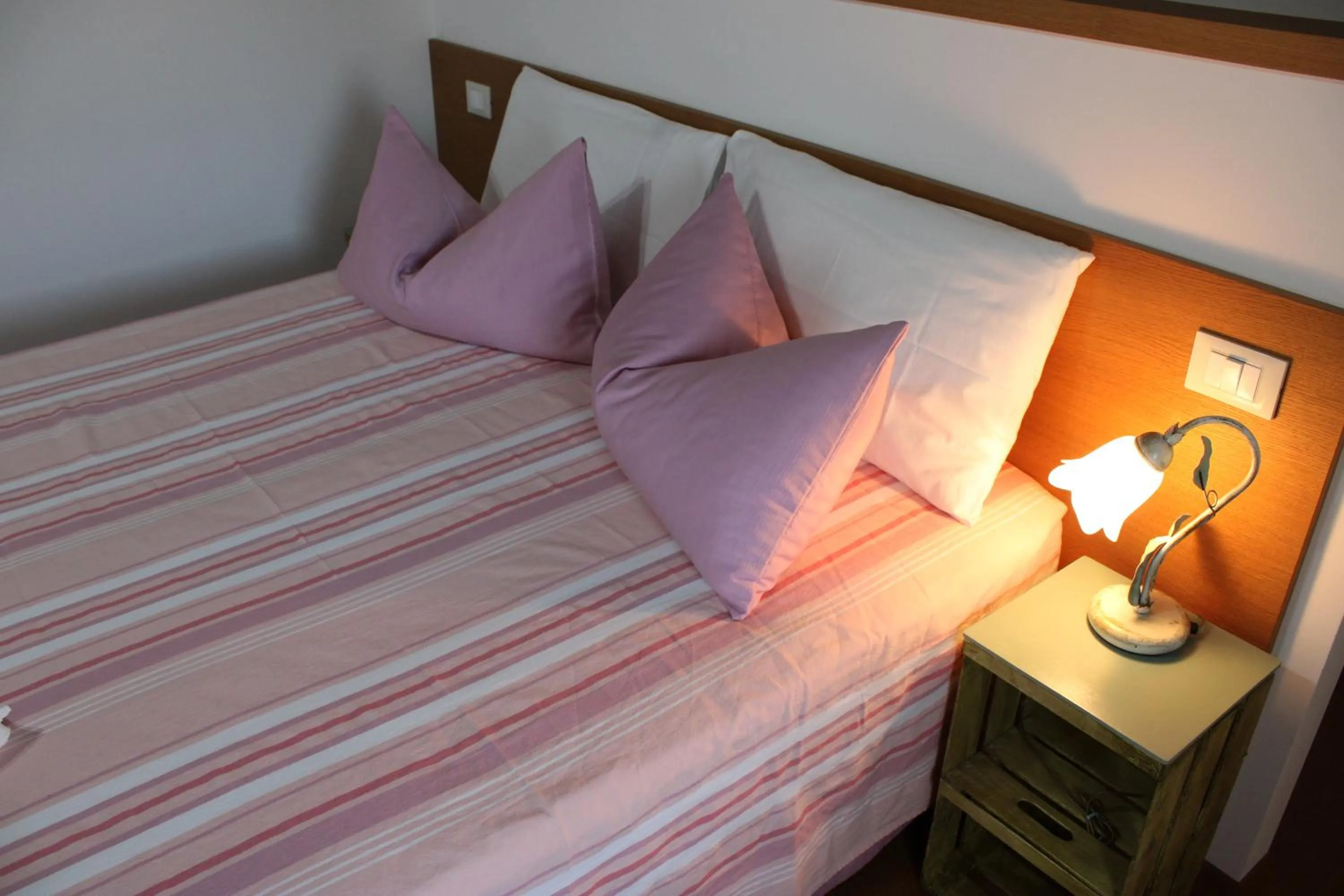 Bed in Giuliva B&B