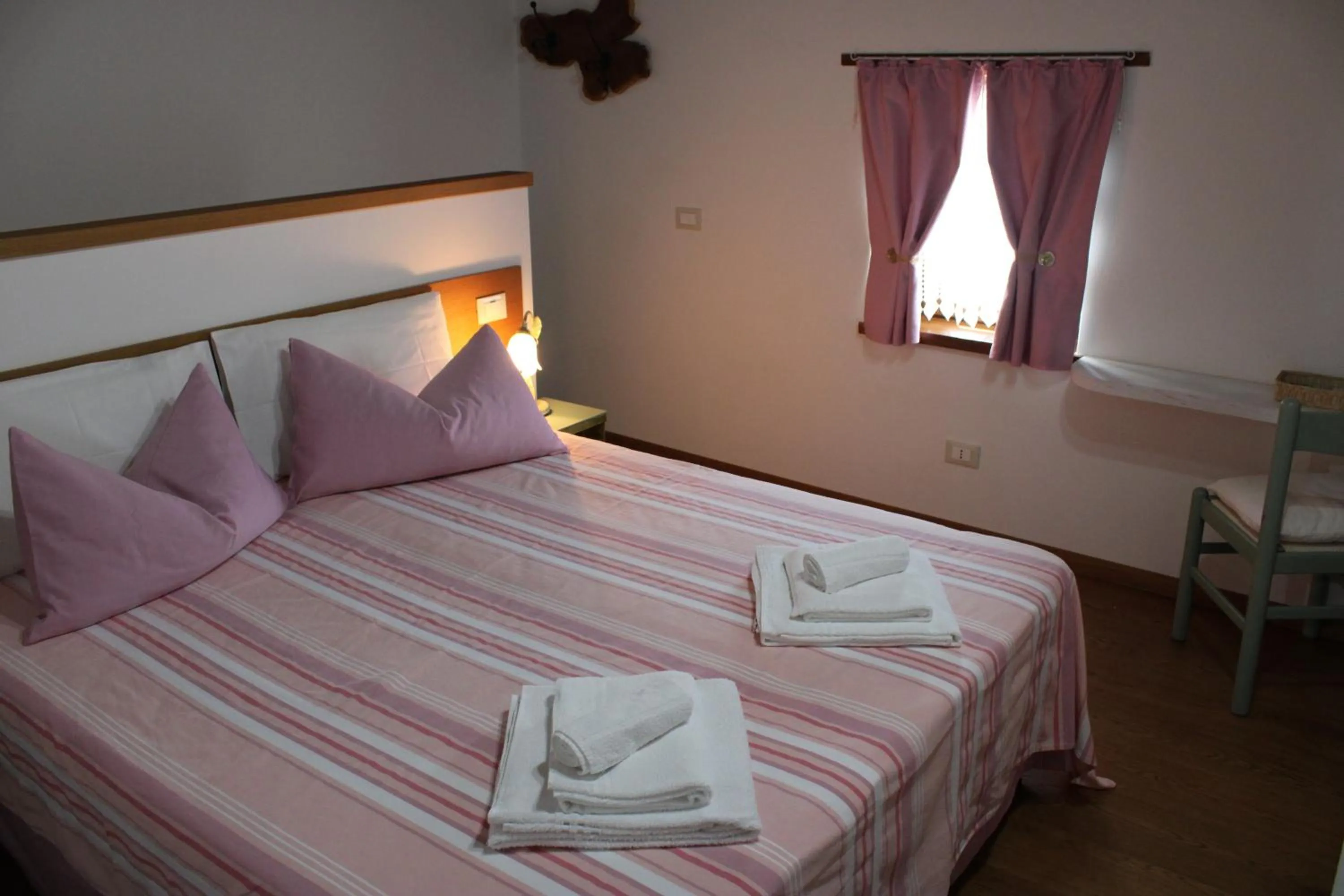 Bed in Giuliva B&B