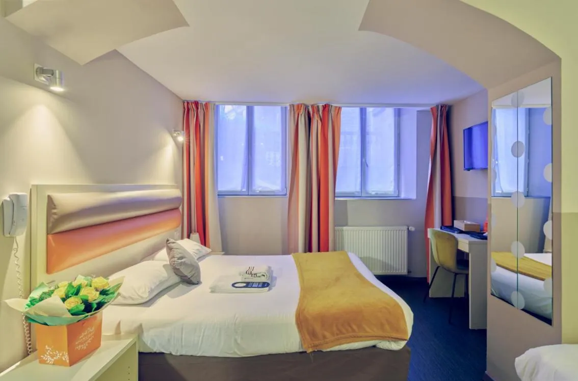 Bed in Adonis Hotel Strasbourg