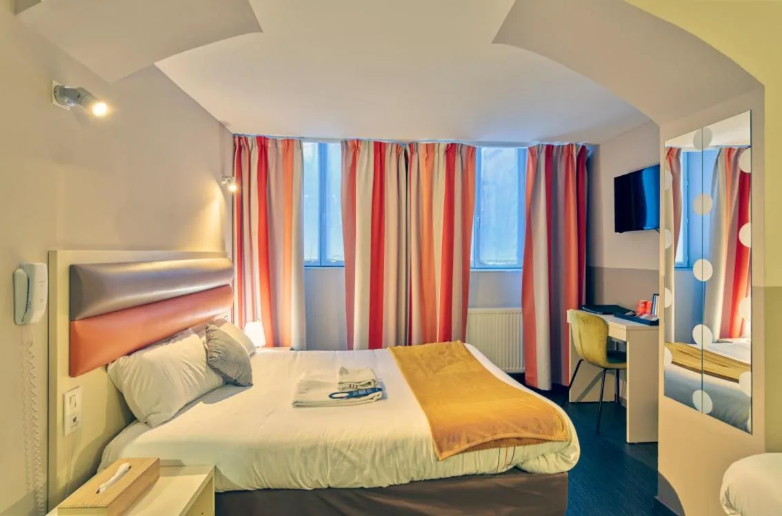 Bed in Adonis Hotel Strasbourg