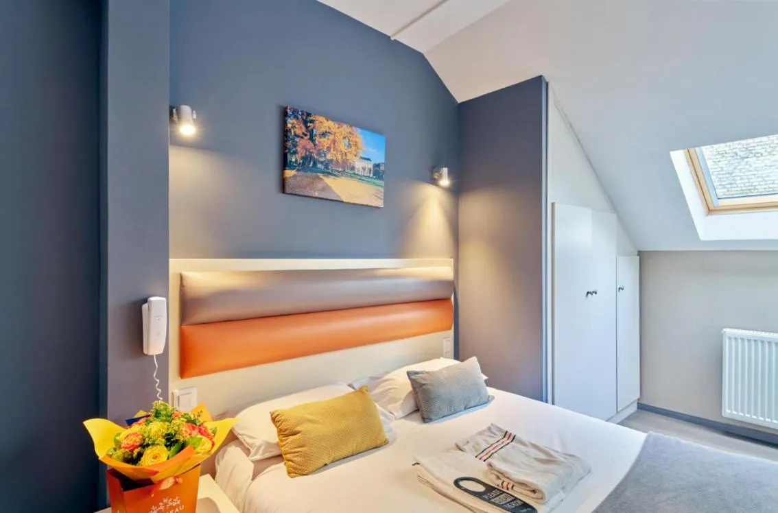 Bed in Adonis Hotel Strasbourg