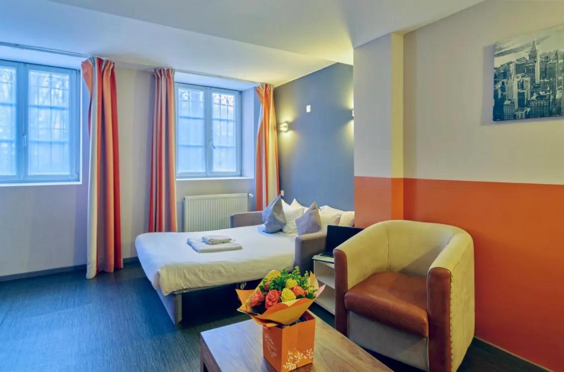 Bed in Adonis Hotel Strasbourg