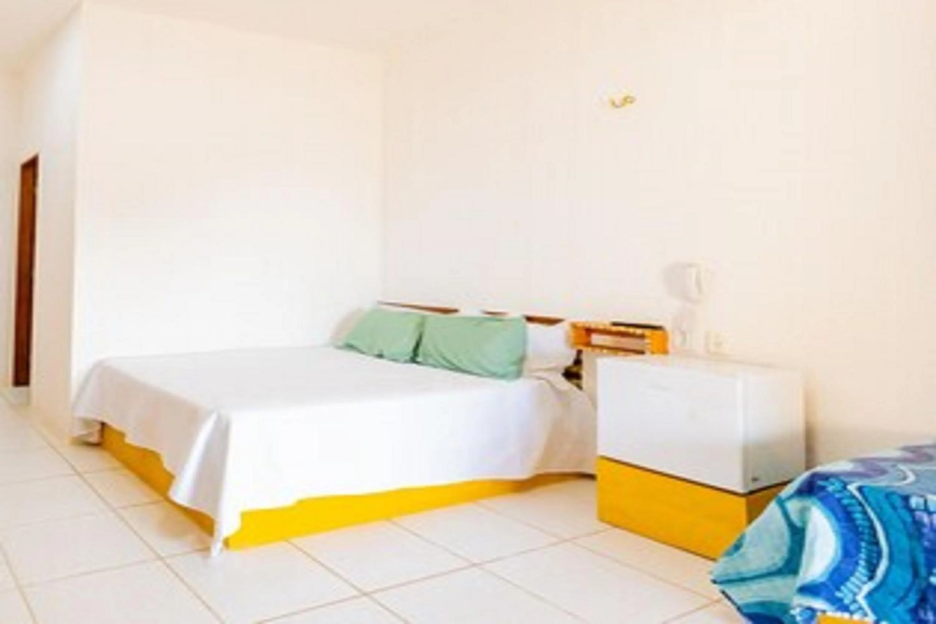 Bedroom in OYO Hotel Das Pedras